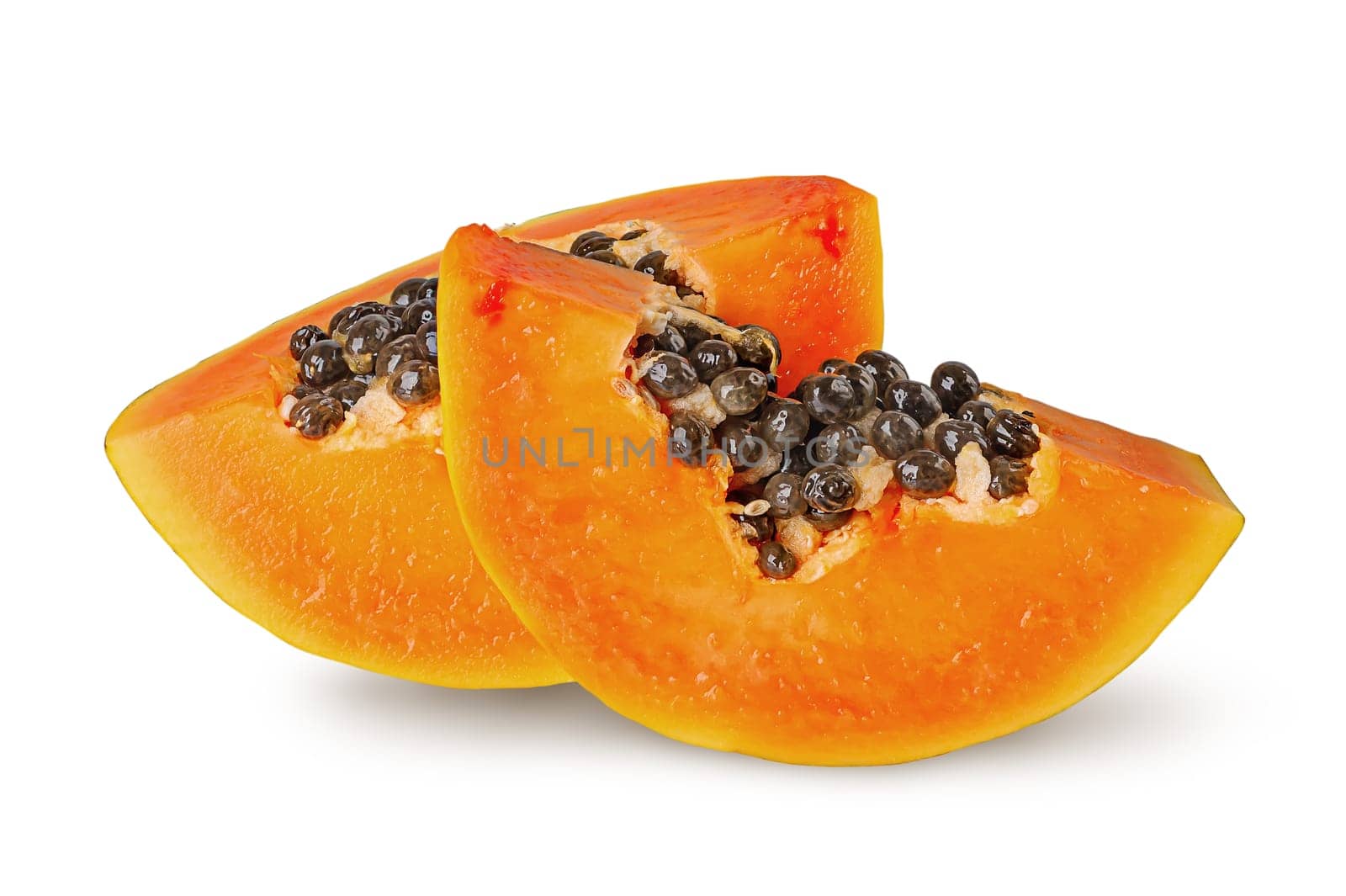 Two slices of ripe papaya isolated on white background