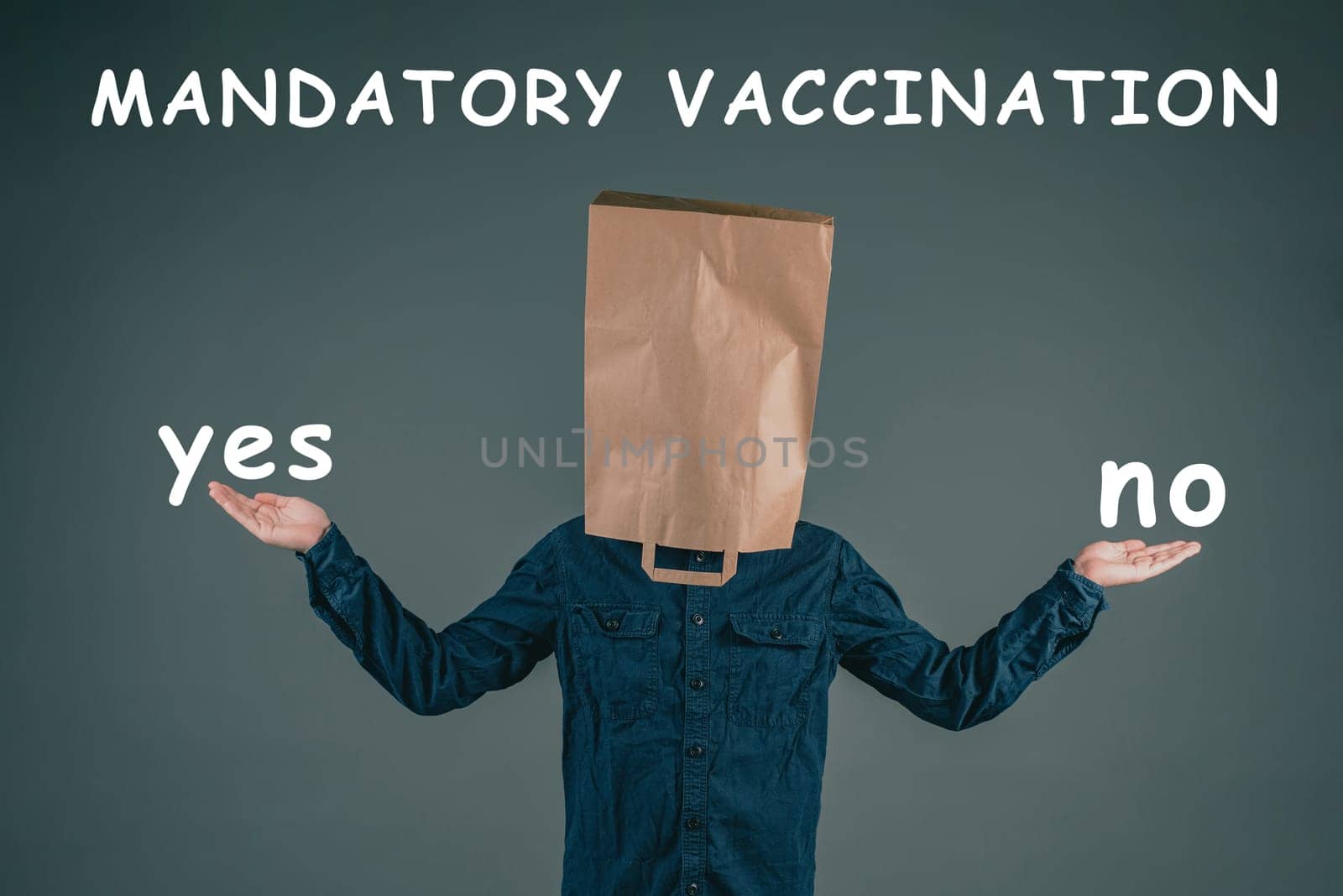 Mandatory vaccination, yes or no, german language, man with paper bag on his head, making a decision, covid-19, pandemic