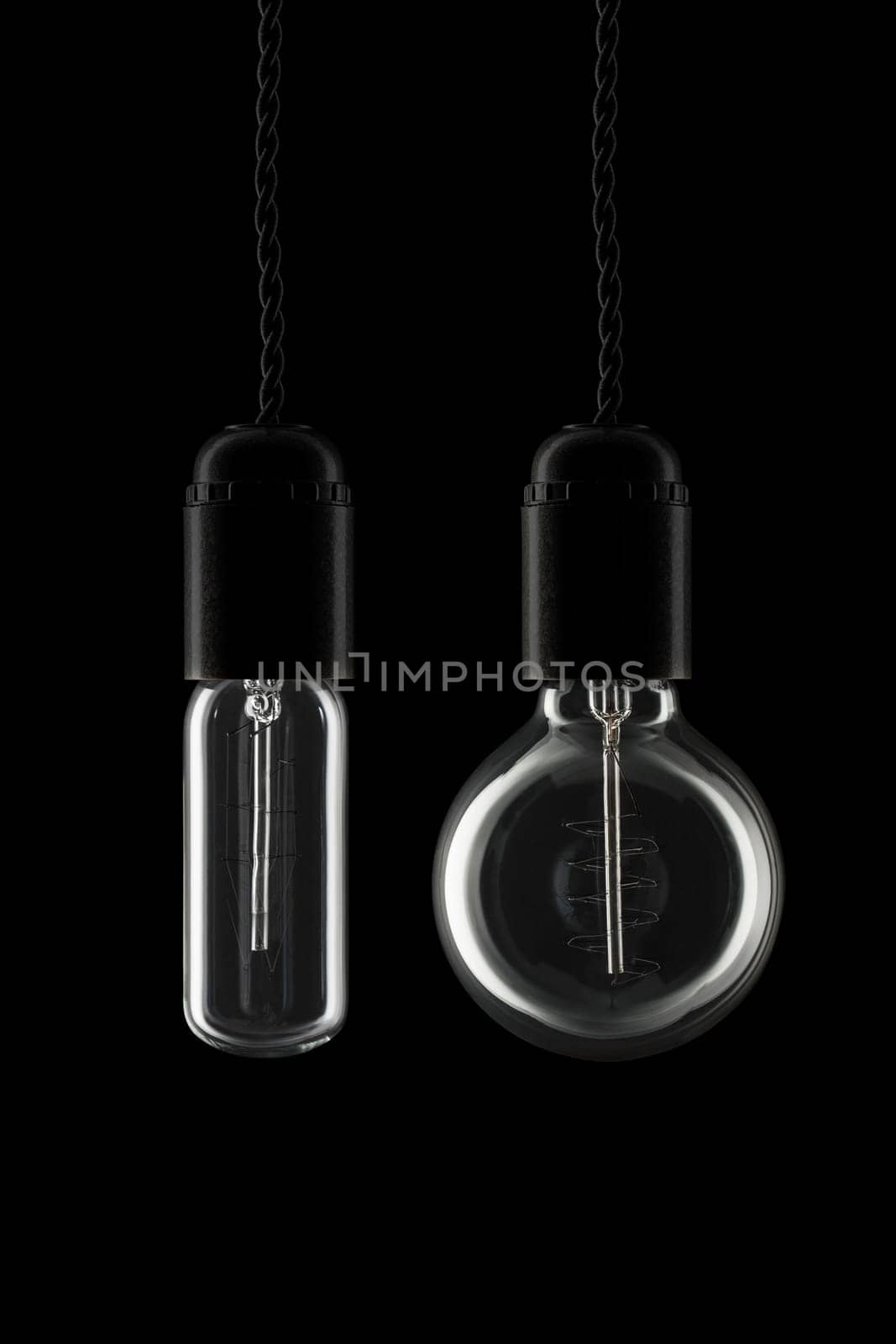 Two different vintage lightbulbs turned off