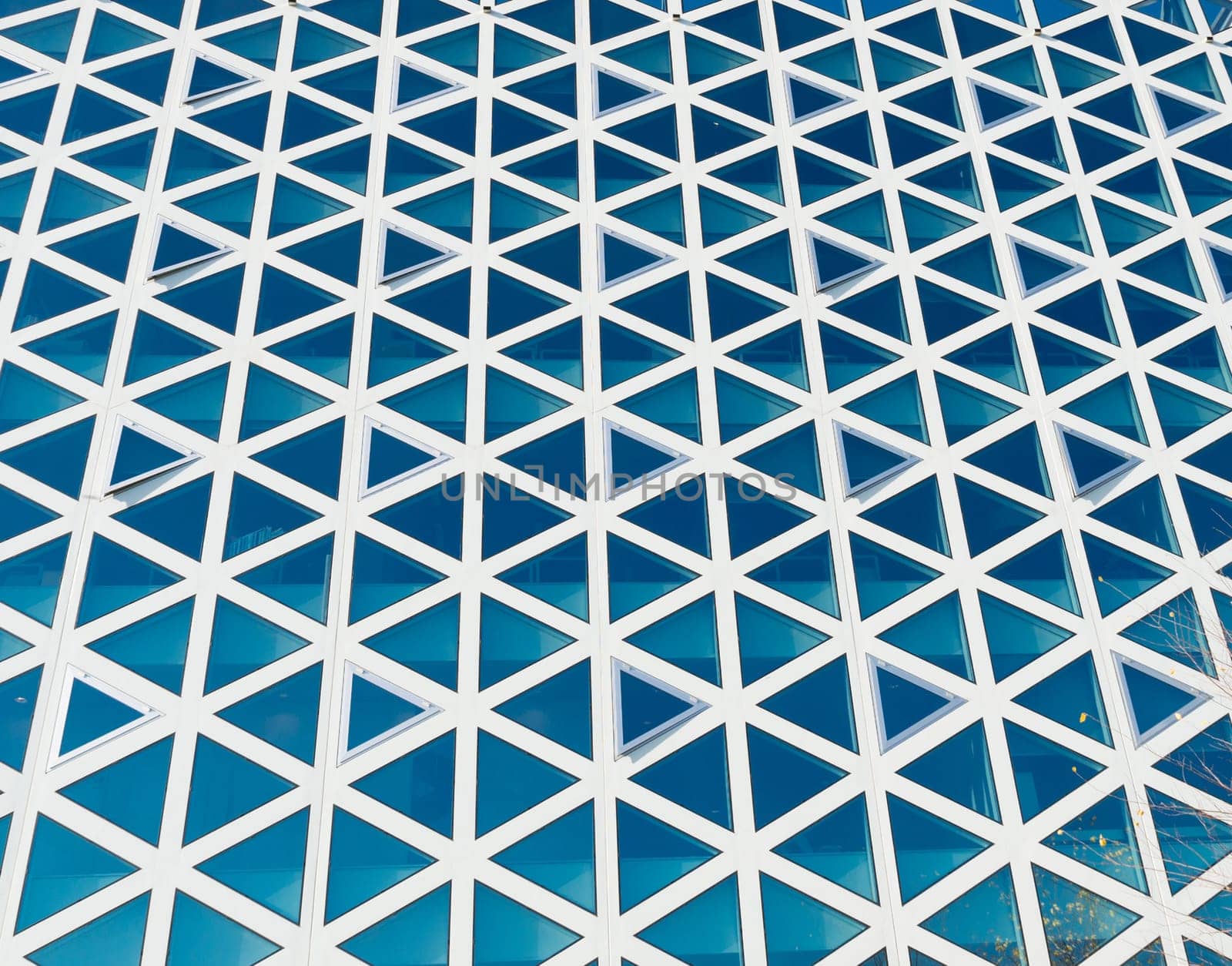 detail of a modern building facade with triangle shaped windows