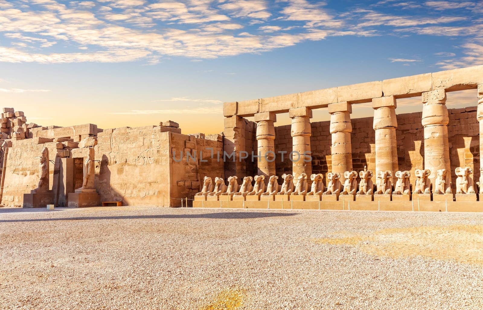 Sphinx statues and the main entrance of Karnak temple, Luxor, Egypt.