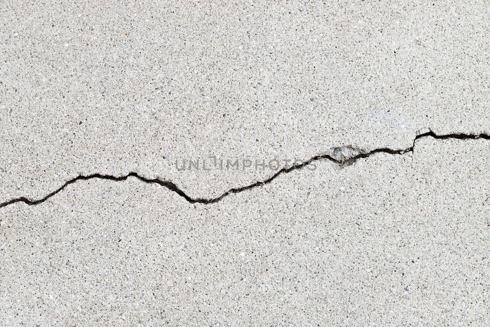 Gray cracked building wall texture for background, copy space