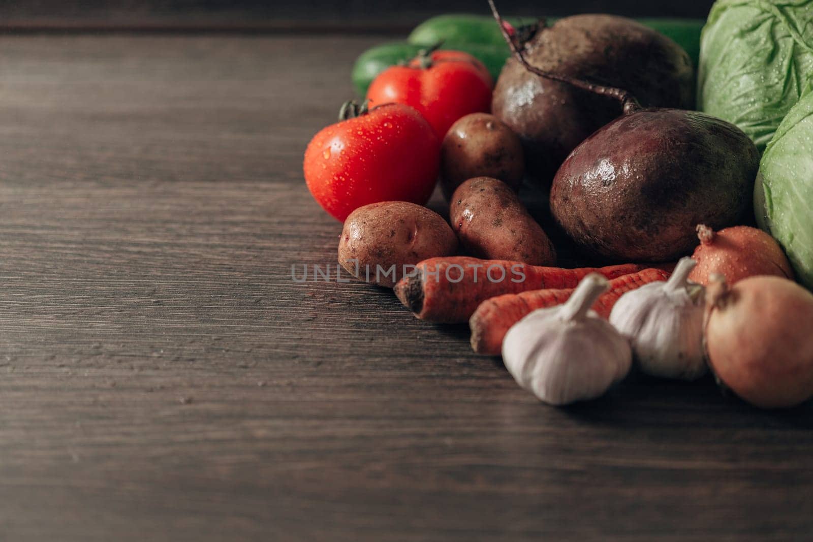 Fresh and Bright Vegetables Lie on the Kitchen Table. Copy Space