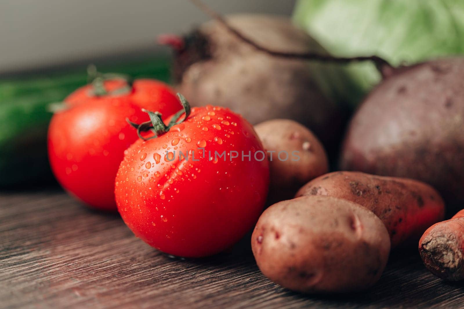 Fresh and Bright Vegetables Lie on the Kitchen Table.