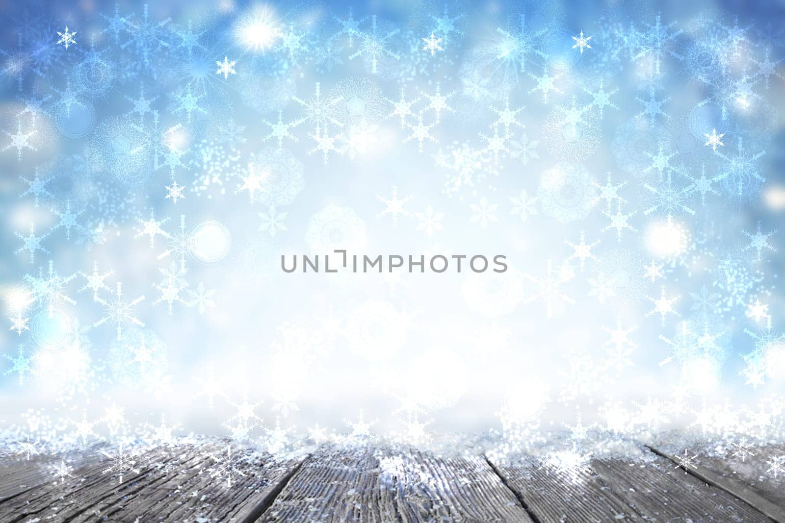 Empty table top winter background. Empty rustic wooden table top or wood floor over abstract light blue winter christmas background. Template for your product display montage. Space.