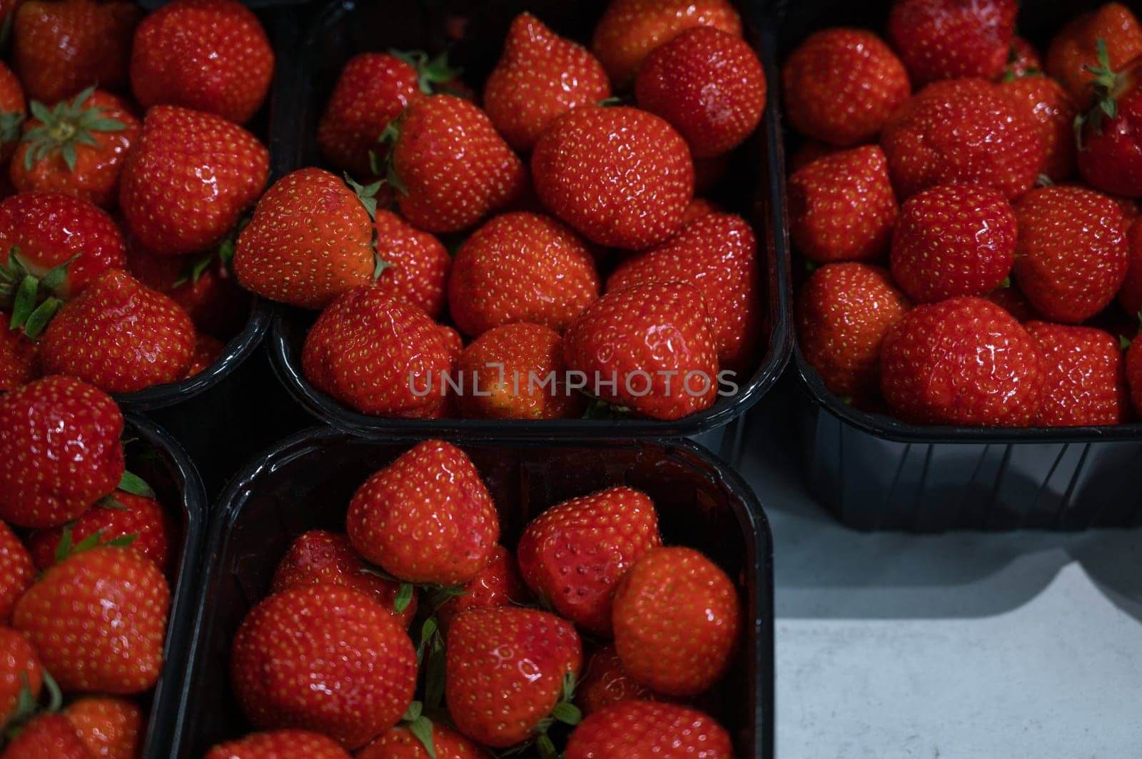 Assortment of fresh strawberry at market