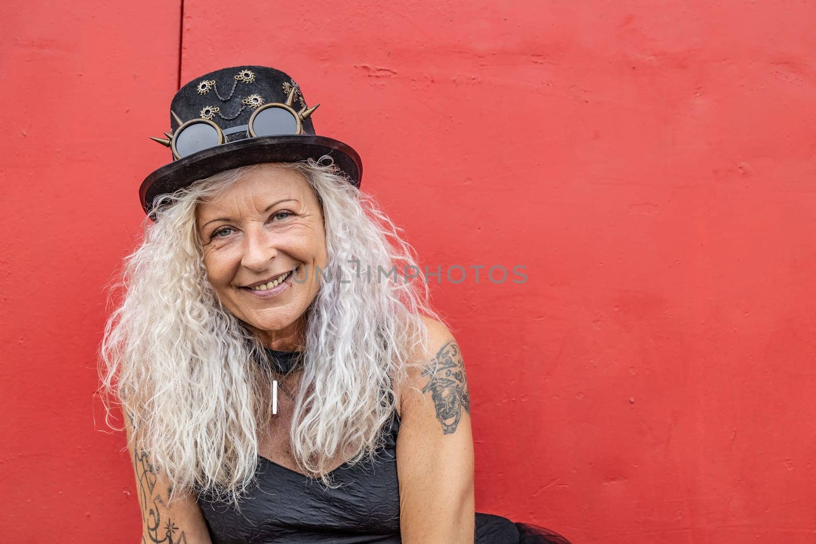 Beautiful Steampunk Lady on a old red Wall Background