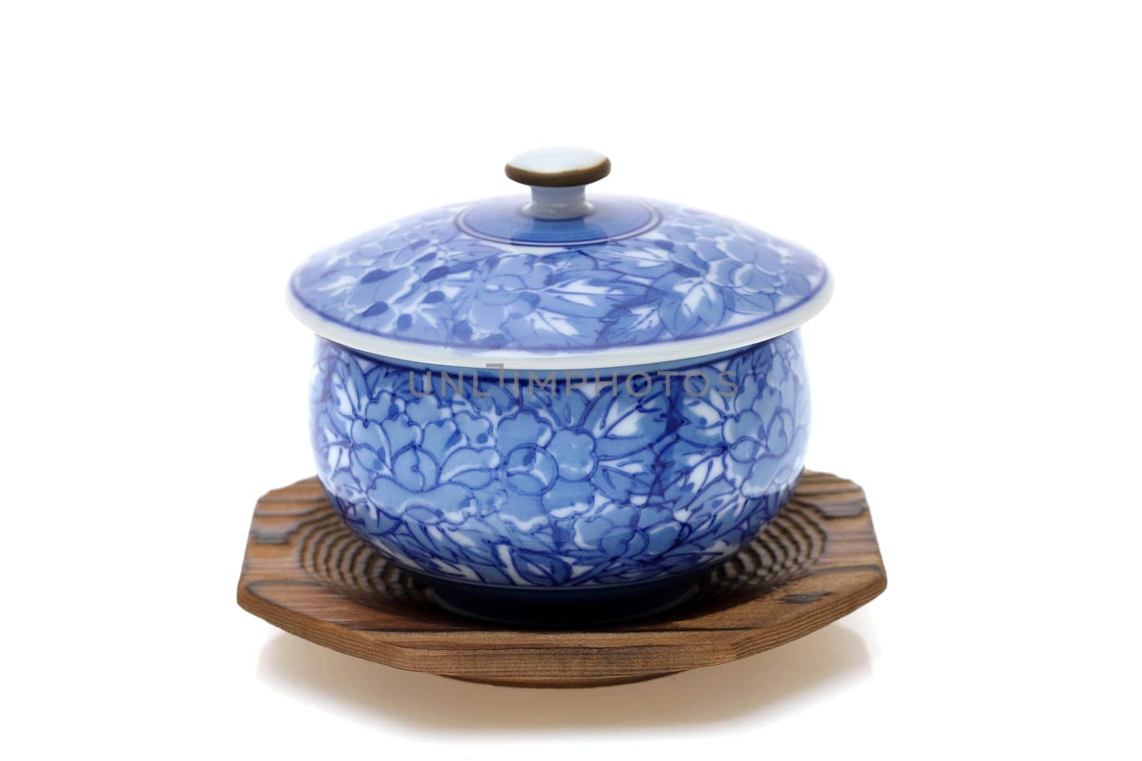 closeup view of ceramic cup for tea on white background