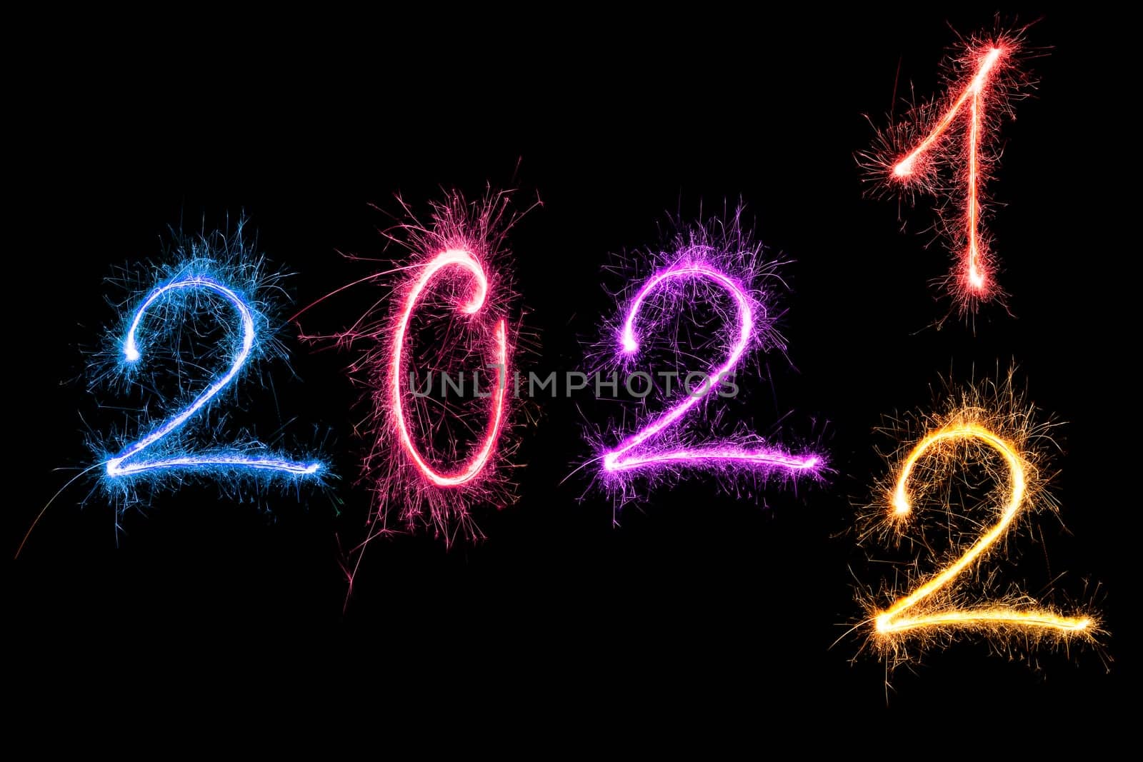 Happy new year greeting. Digits 2022 made from fireworks isolated on black background.