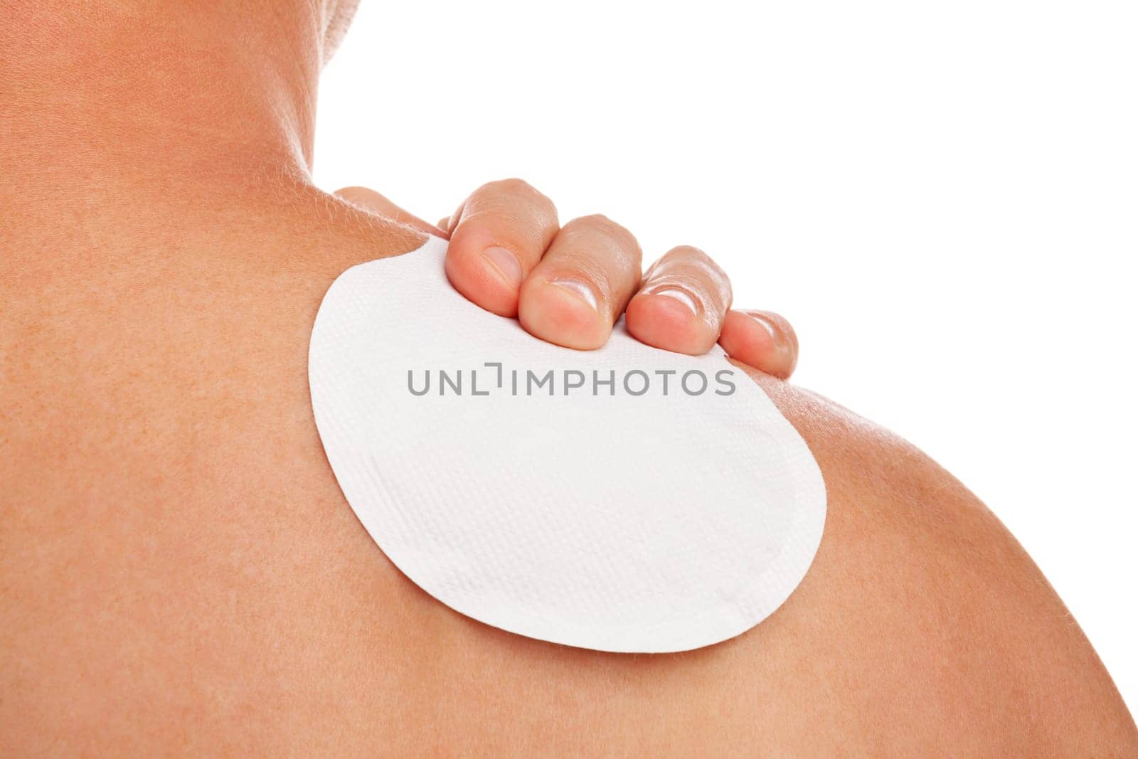 Medical patch therapy for pain relief with an occupational disease syndrome of a young man with shoulder pain. Health problems from the overworked concept.