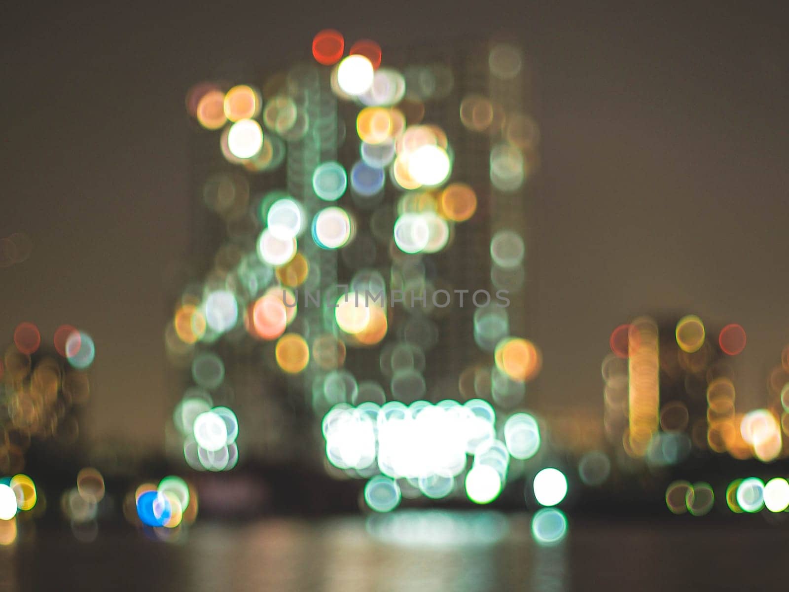Bokeh city lights background. Bokeh of cityscape skyline during evening dark blue sunset, dusk twilight