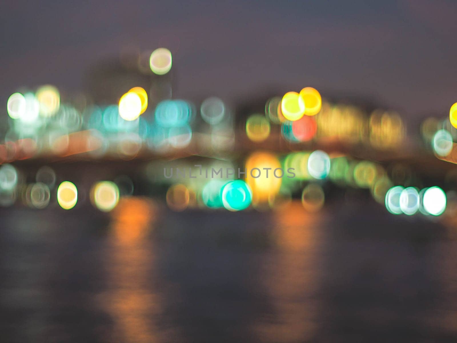 Bokeh city lights background. Bokeh of cityscape skyline during evening dark blue sunset, dusk twilight