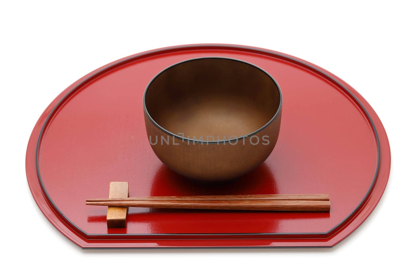Miso soup bowl with chopsticks on tray, Traditional tableware of Japan. isolated on white background