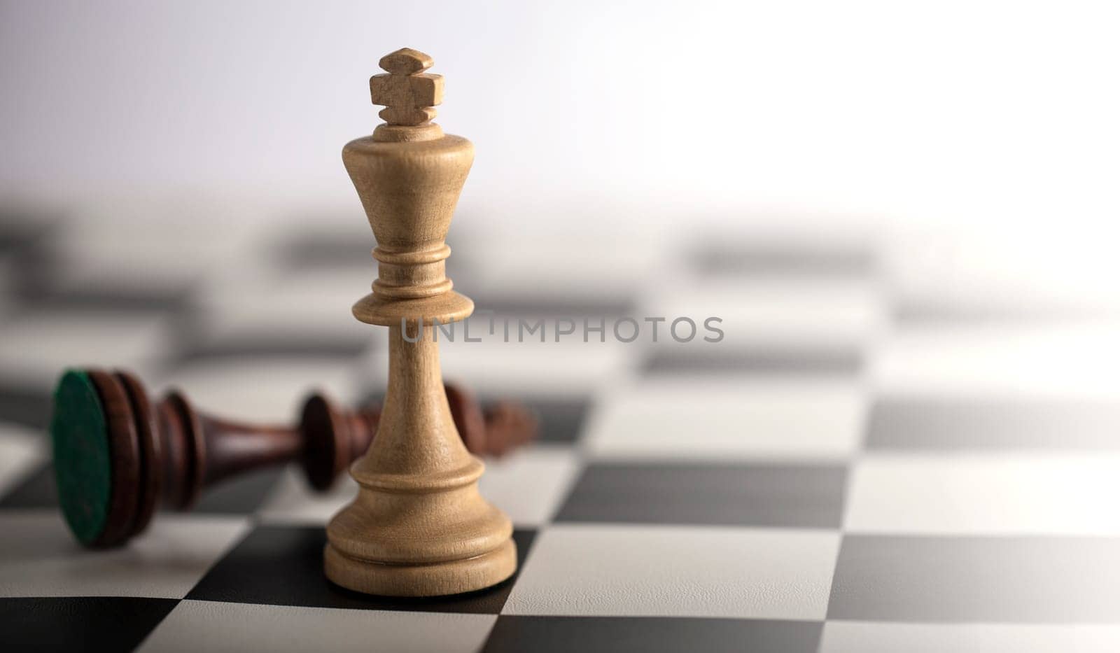 The Chess pieces on a chessboard. The concept of playing and winning a chess tournament