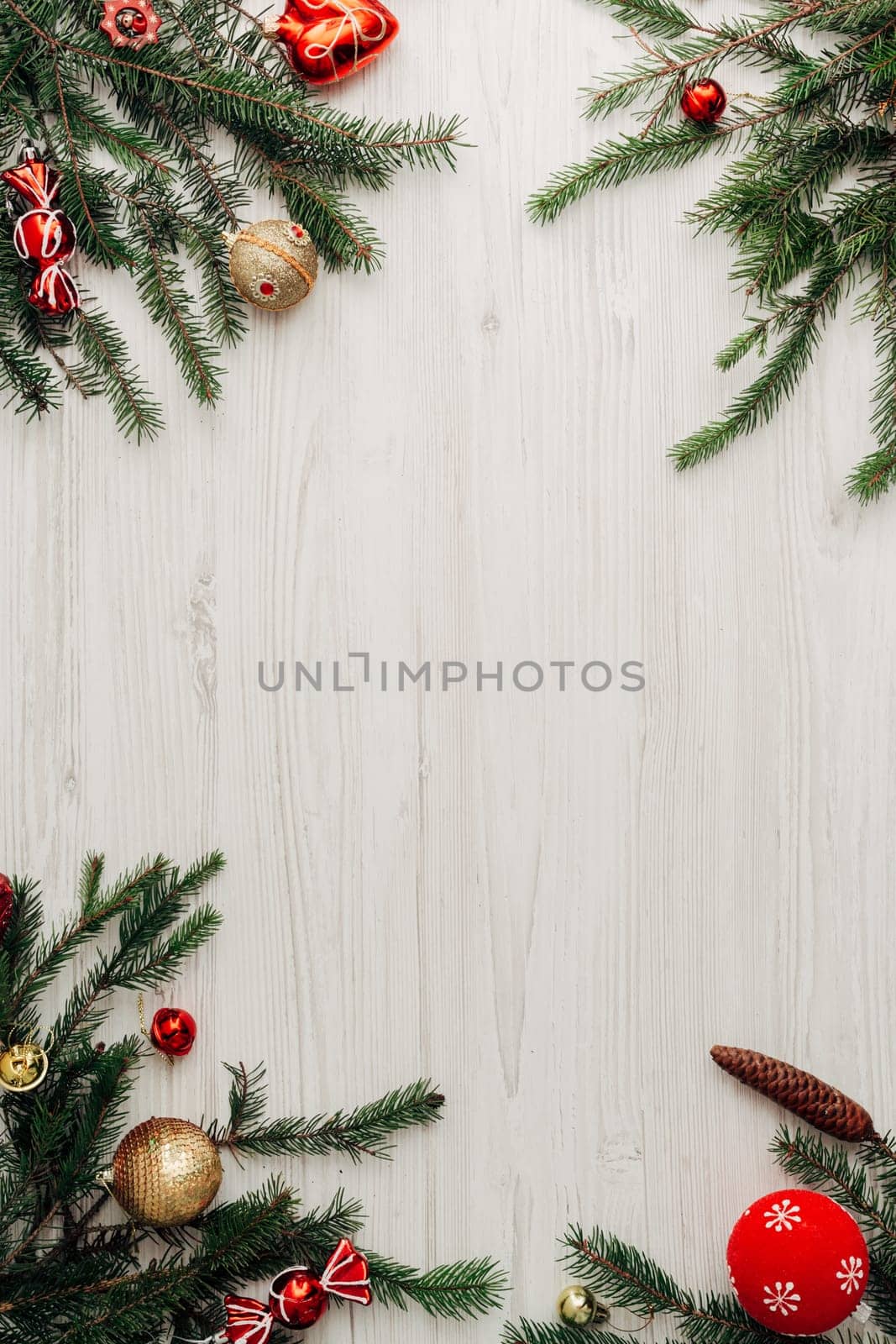 Christmas Red Decorations on a White Wooden Table with Copy Space Text