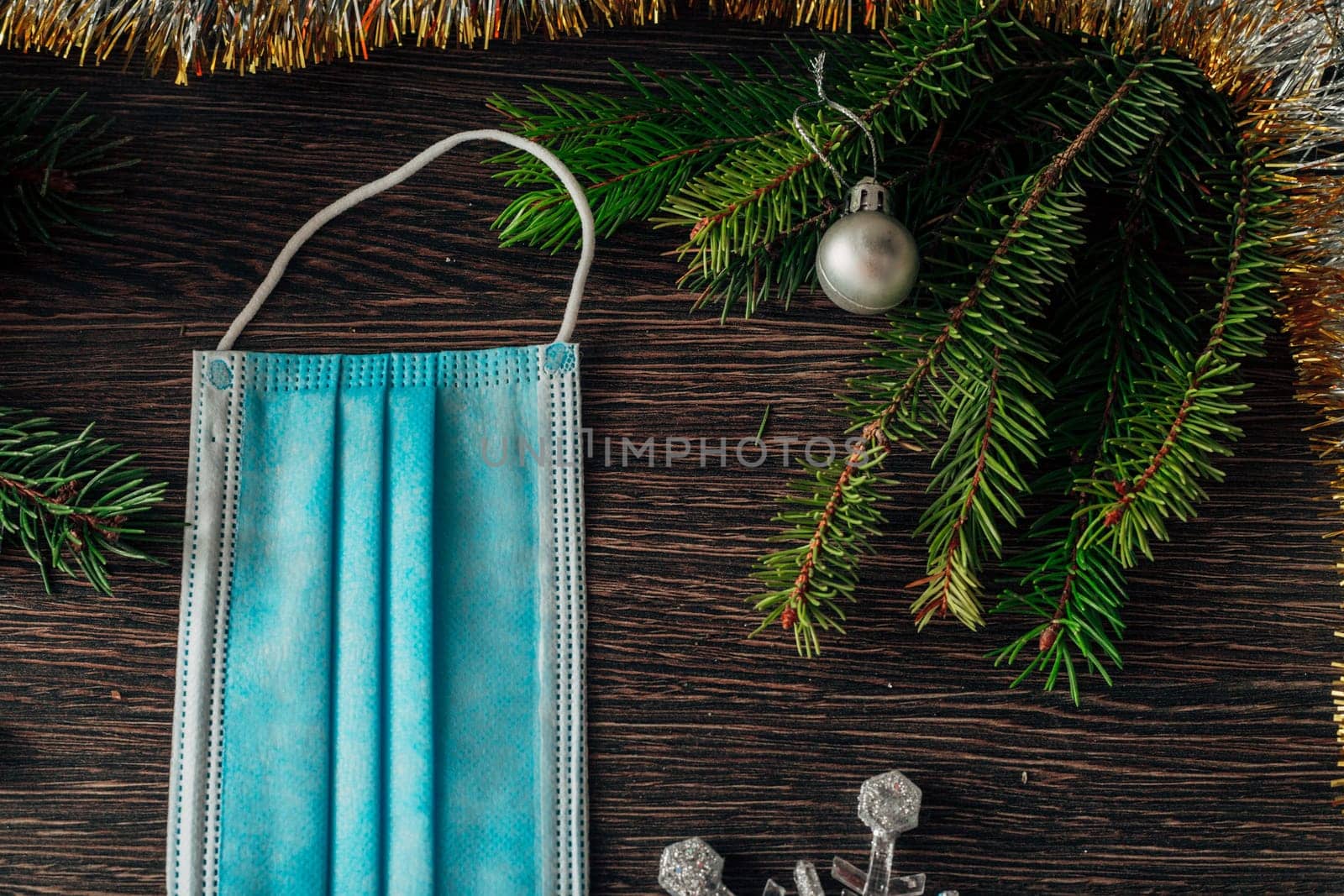 Decoration of Christmas Tree Green Branches on a Brown Background