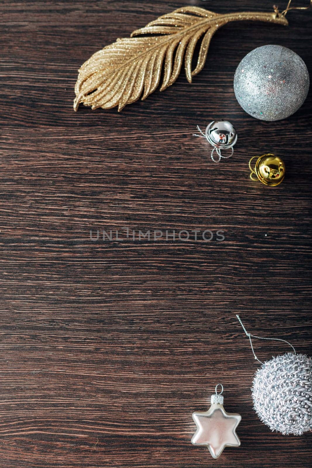 Decoration of Christmas Tree Green Branches on a Brown Background with Copy Space