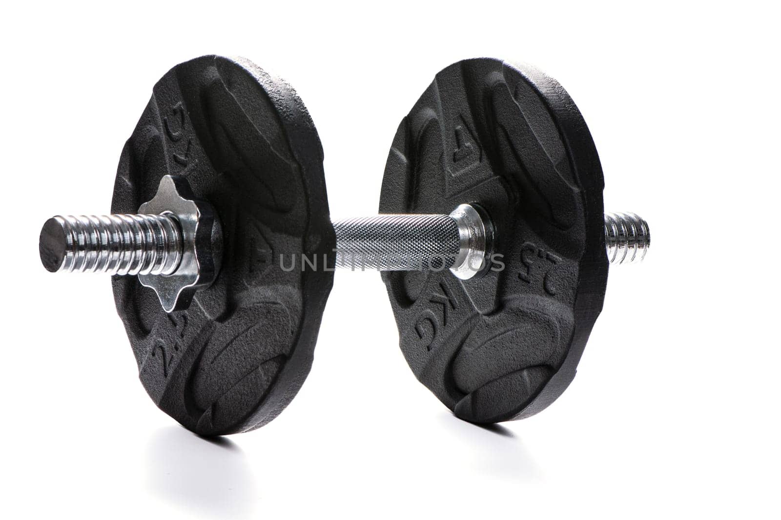 Metal dumbbell with black pancakes and chrome fingerboard on a white insulated background. High quality photo