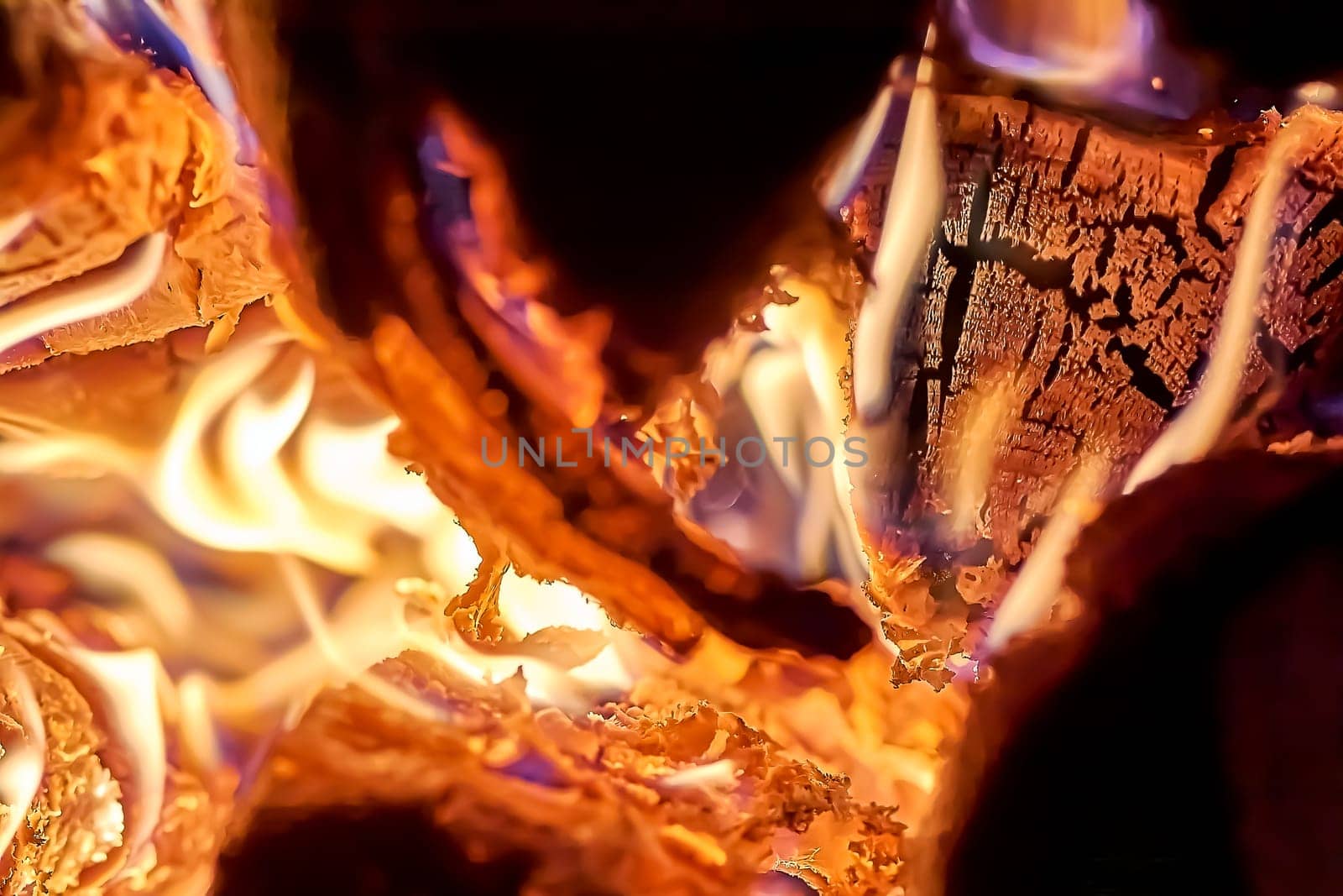the stove is heated with firewood. High quality photo