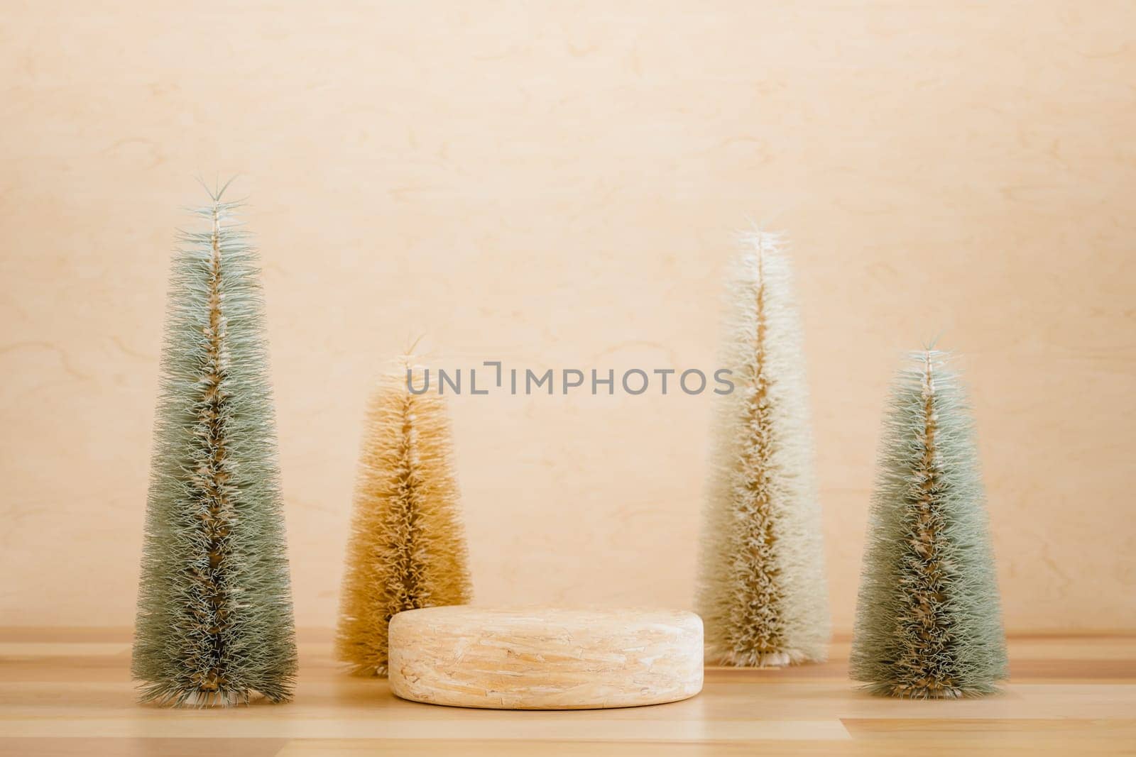 Wooden podium pedestal product mockup display with miniature Christmas trees in beige and green, 3d illustration