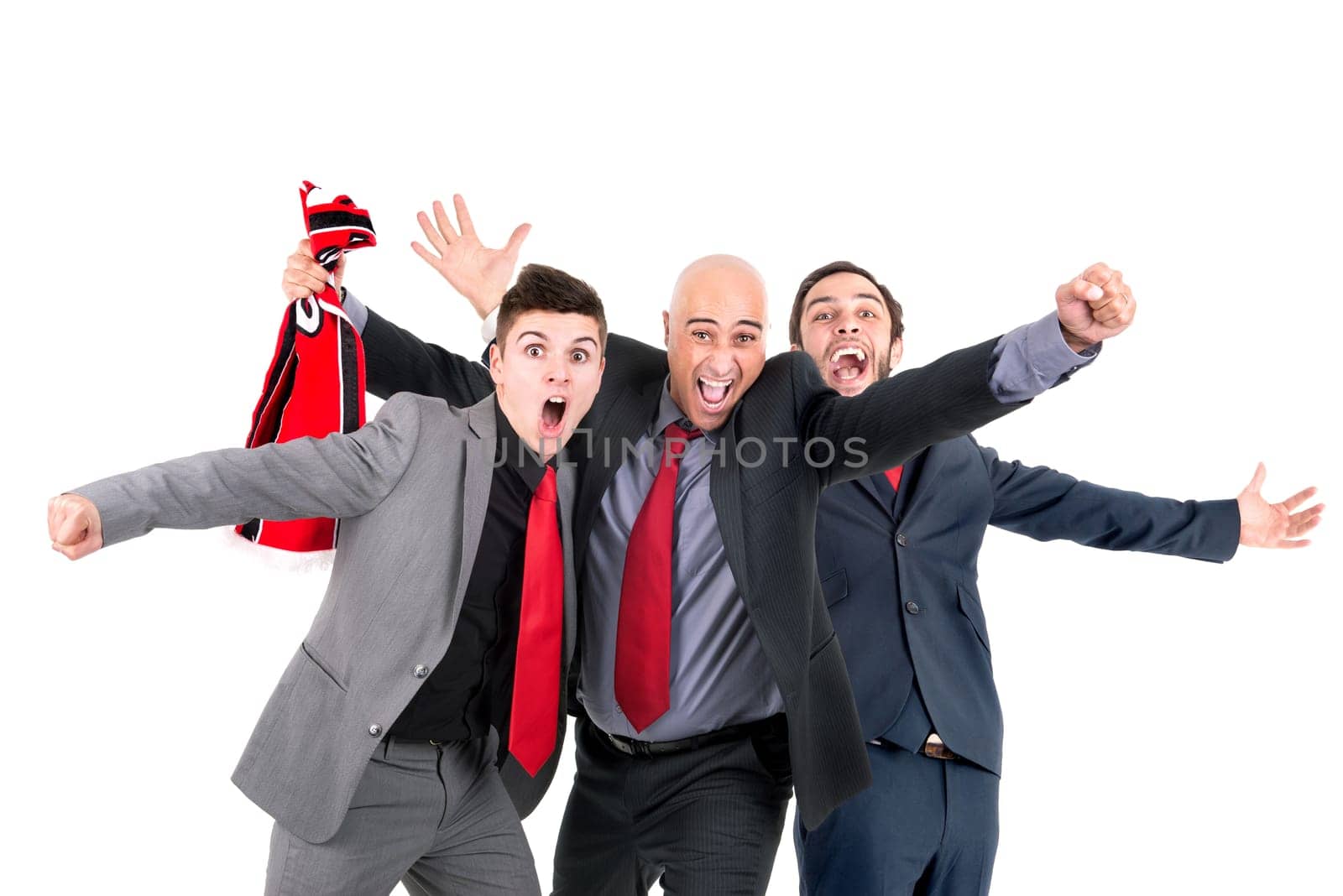 Happy businessmen with football scarf celebrating a victory isolated in white
