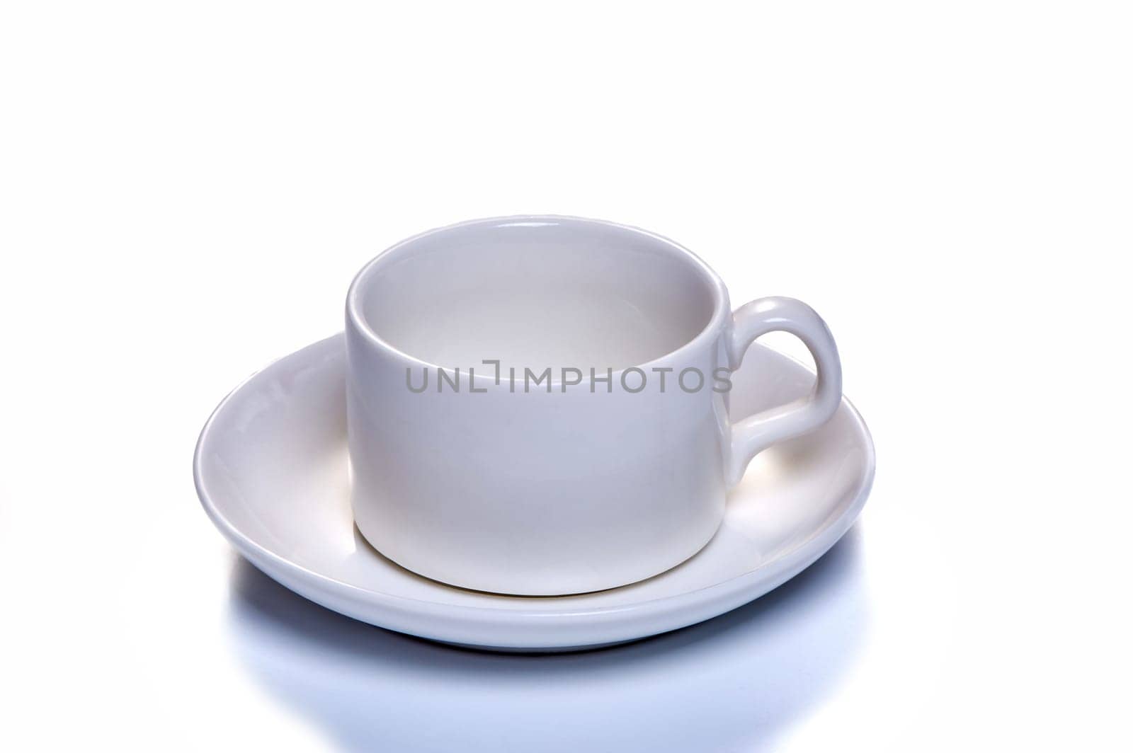 white coffee cup with saucer on white isolated background. High quality photo