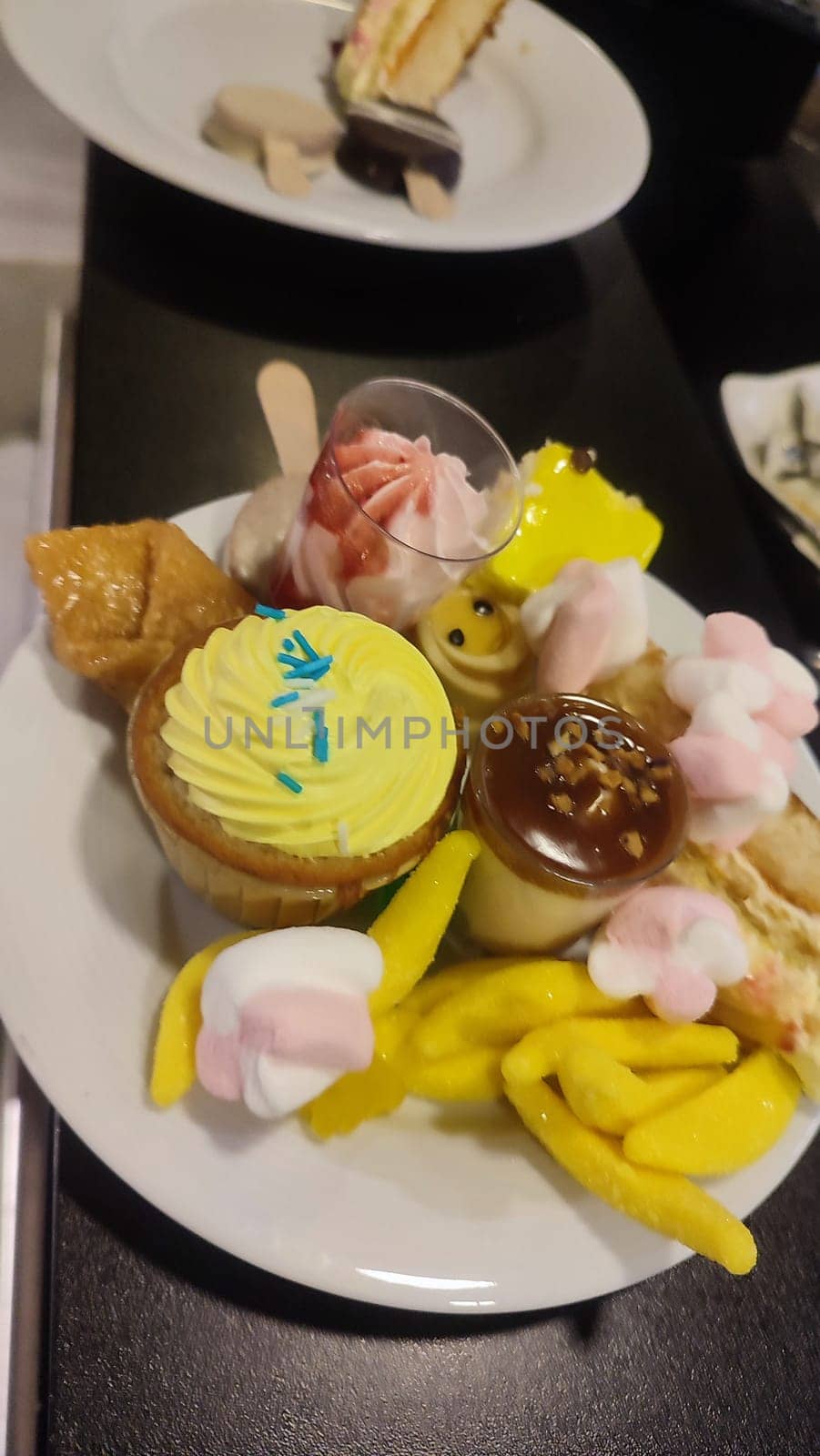sweet cakes with cream, desserts desserts food white plate kitchen tasty cooking cafe restaurant breakfast morning ice cream. High quality photo vertical format image