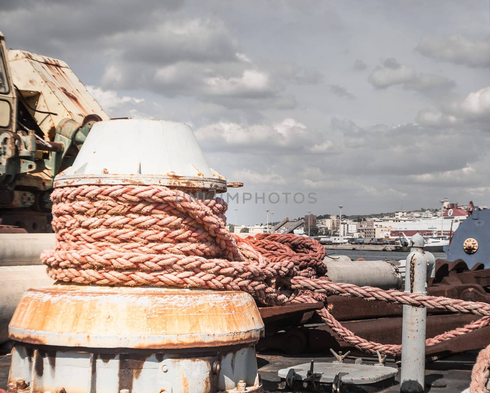 Ropes in an old crane. Orange lines .