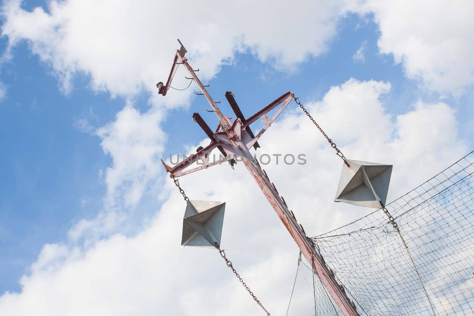 Targets for warship, with blue sky and clouds in background.