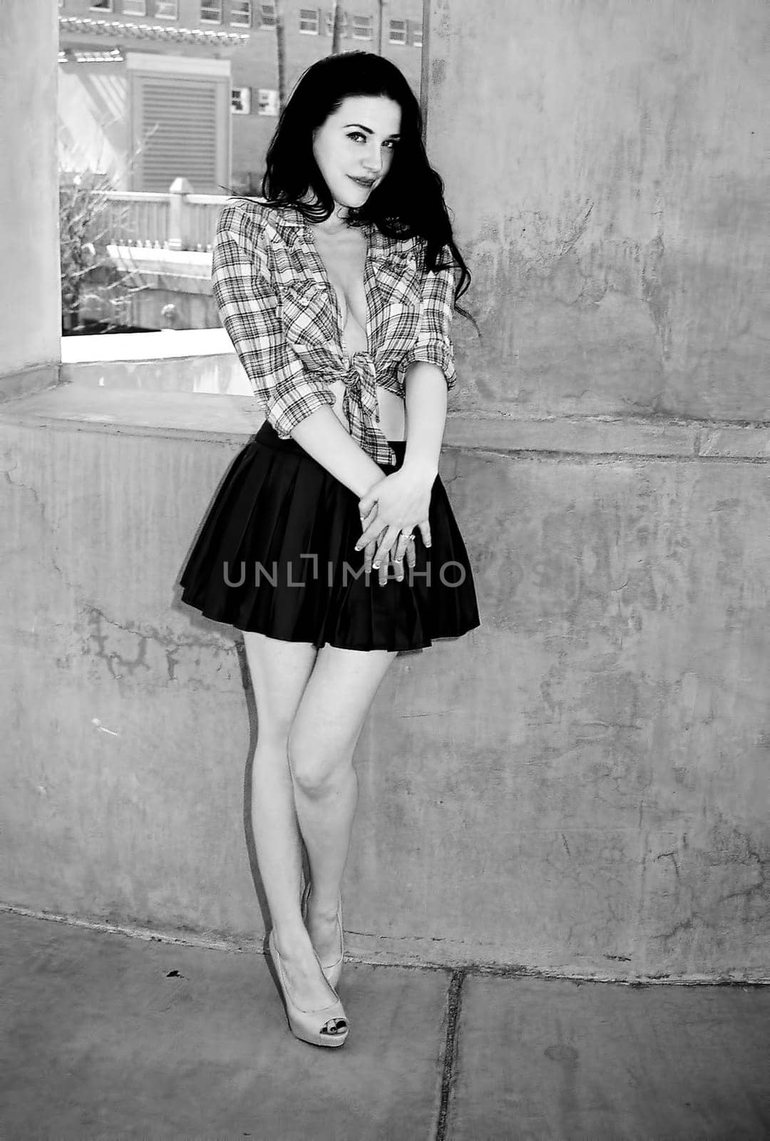 A lovely model female model posing outdoors