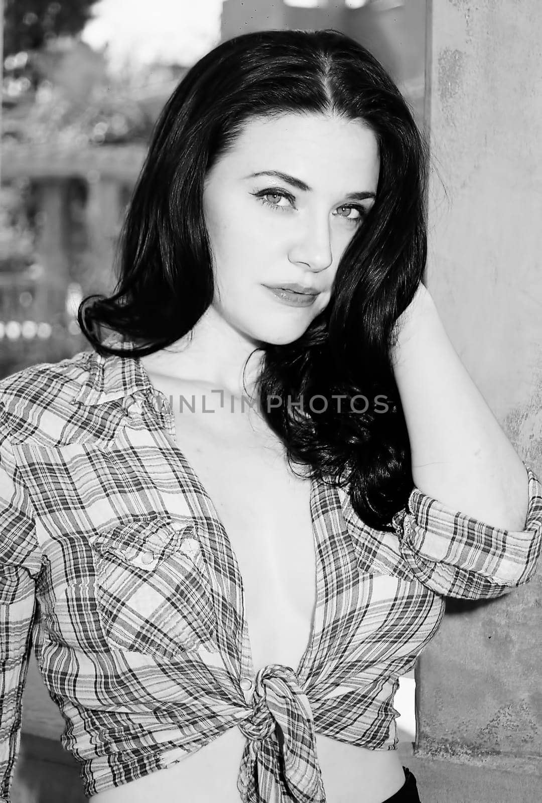 A lovely model female model posing outdoors