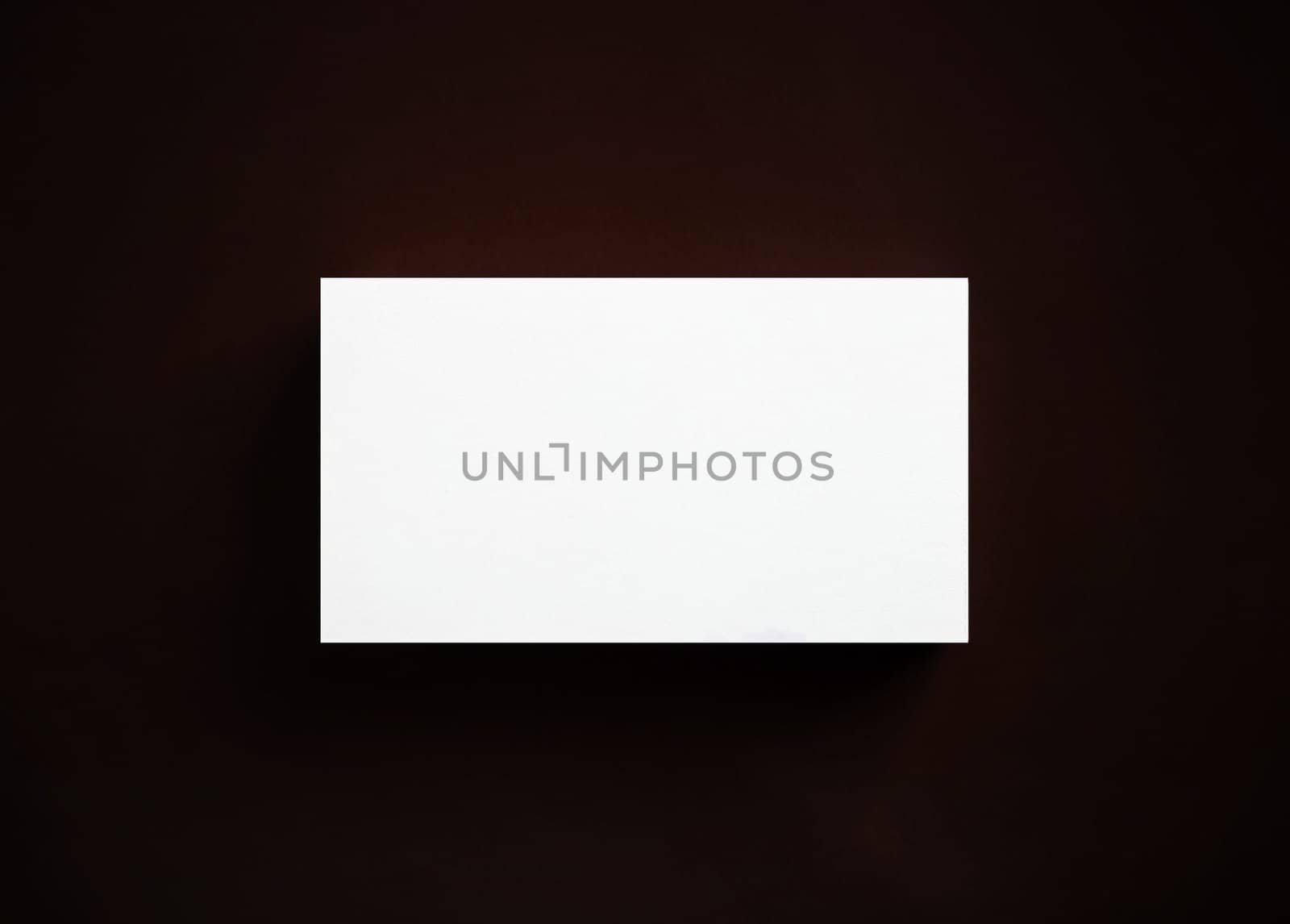 Photo of blank business card. Branding ID template. Top view. Flat lay.