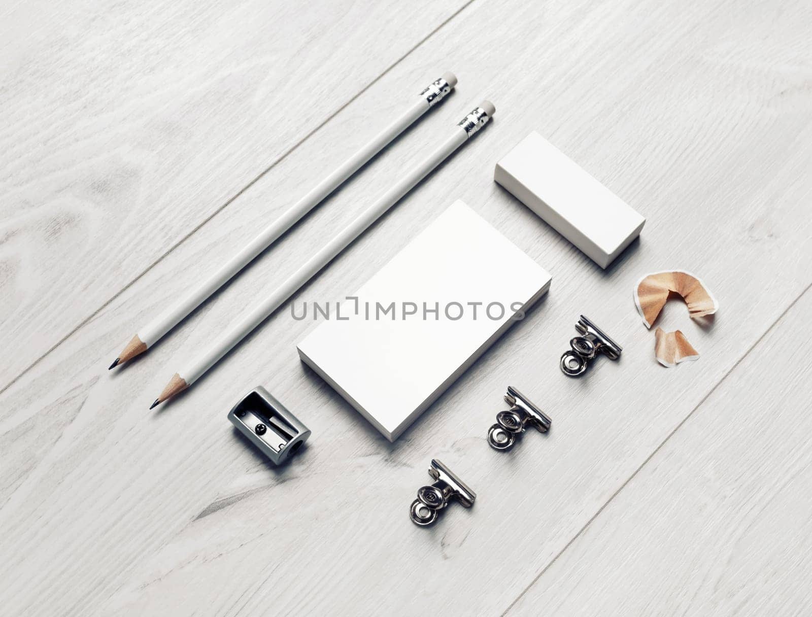 Blank stationery and corporate identity template on light wooden background. Responsive design mockup.