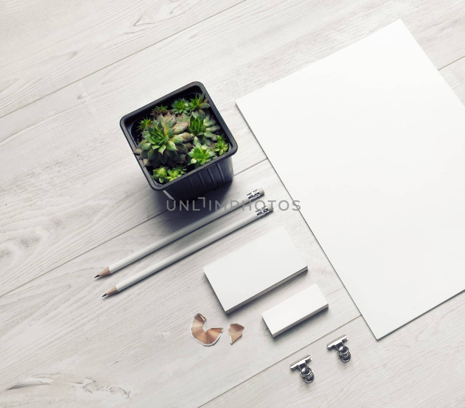 Blank stationery template on light wooden background. Mock-up for branding identity. For design presentations and portfolios.