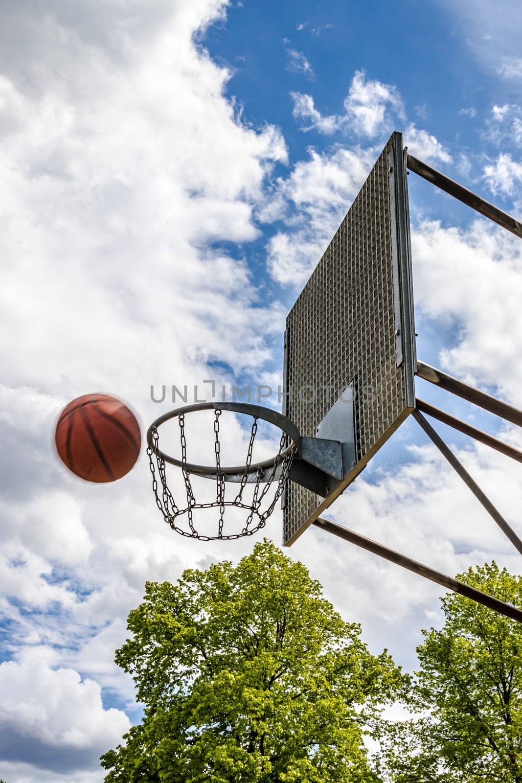 Weathered Basketball Hoop on a sunny day in summertime