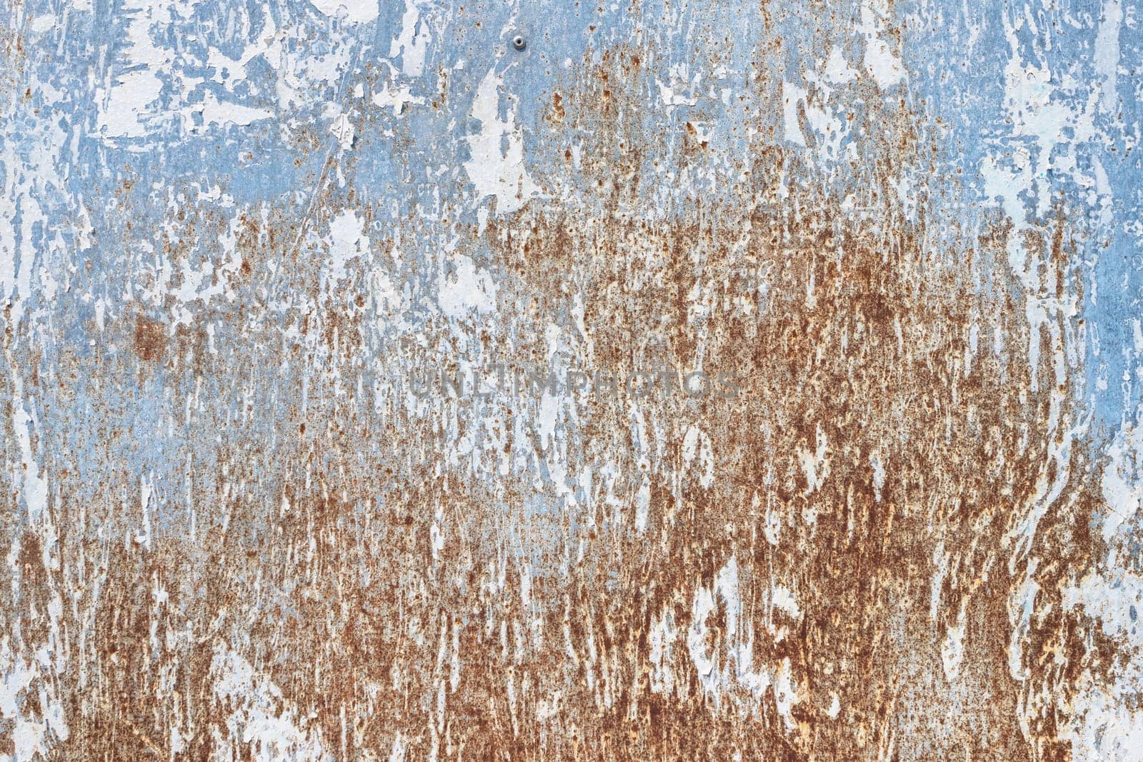 Rusty metal panel texture background. Metal surface with detailed traces of corrosion, rust and scratches.