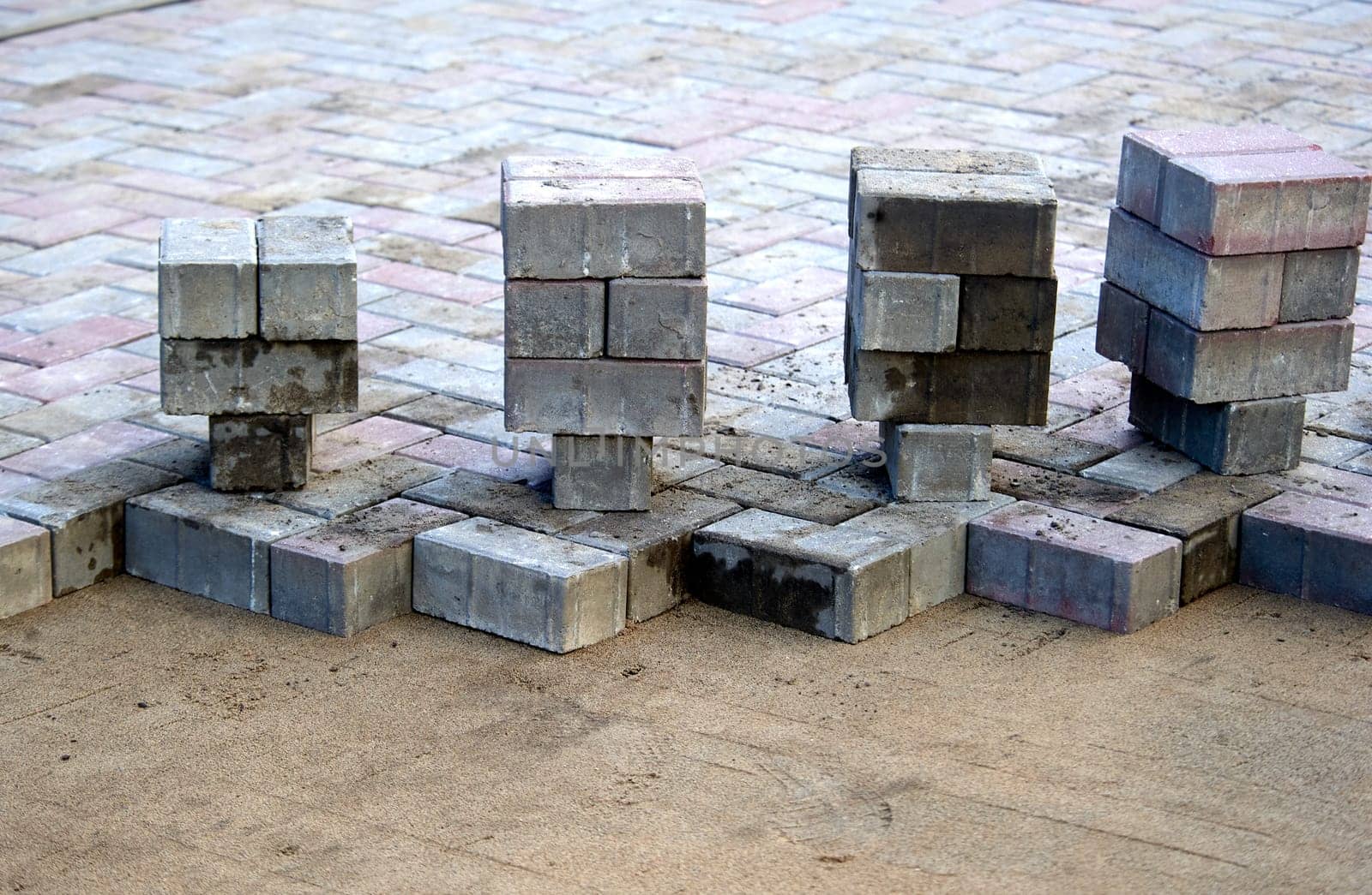 paving slabs prepared for laying on a sand cushion. High quality photo
