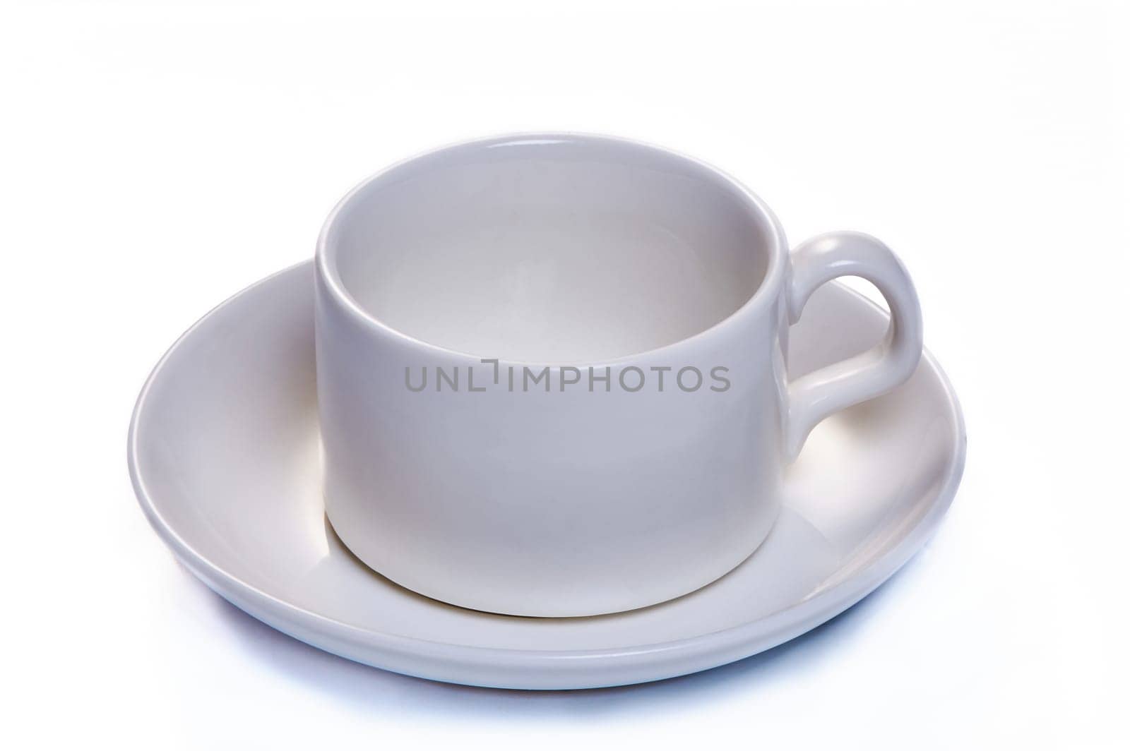 white coffee cup with saucer on white isolated background. High quality photo