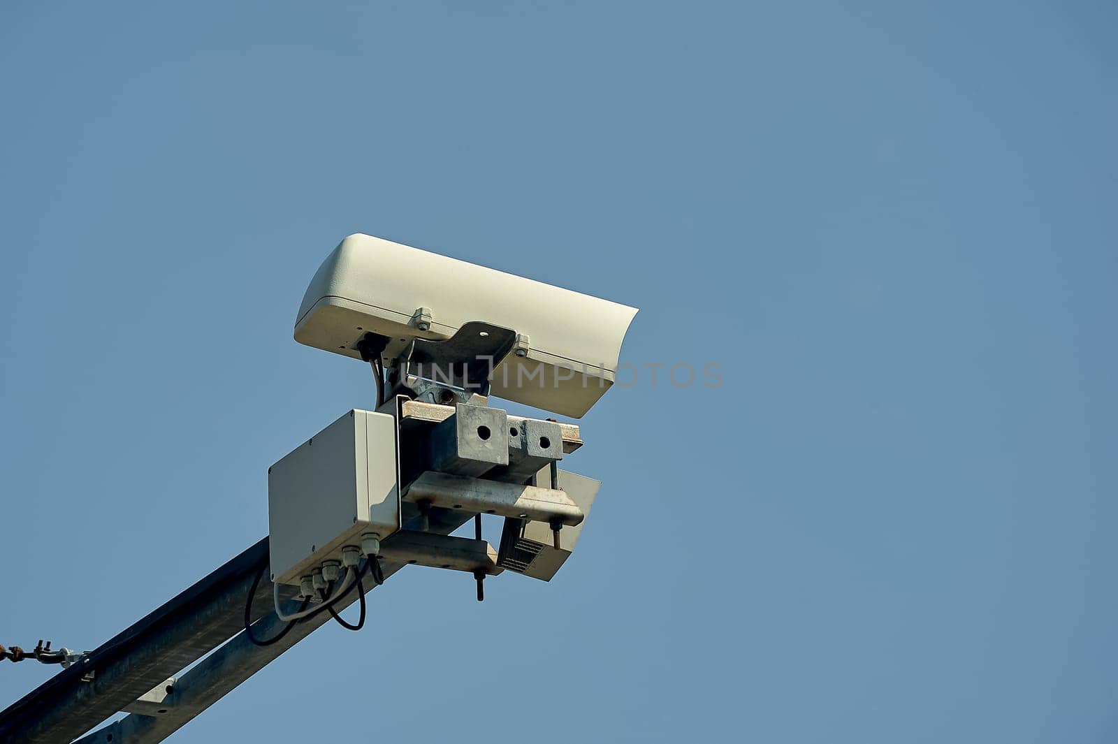 a video recording camera of violations is hanging on a pole. High quality photo