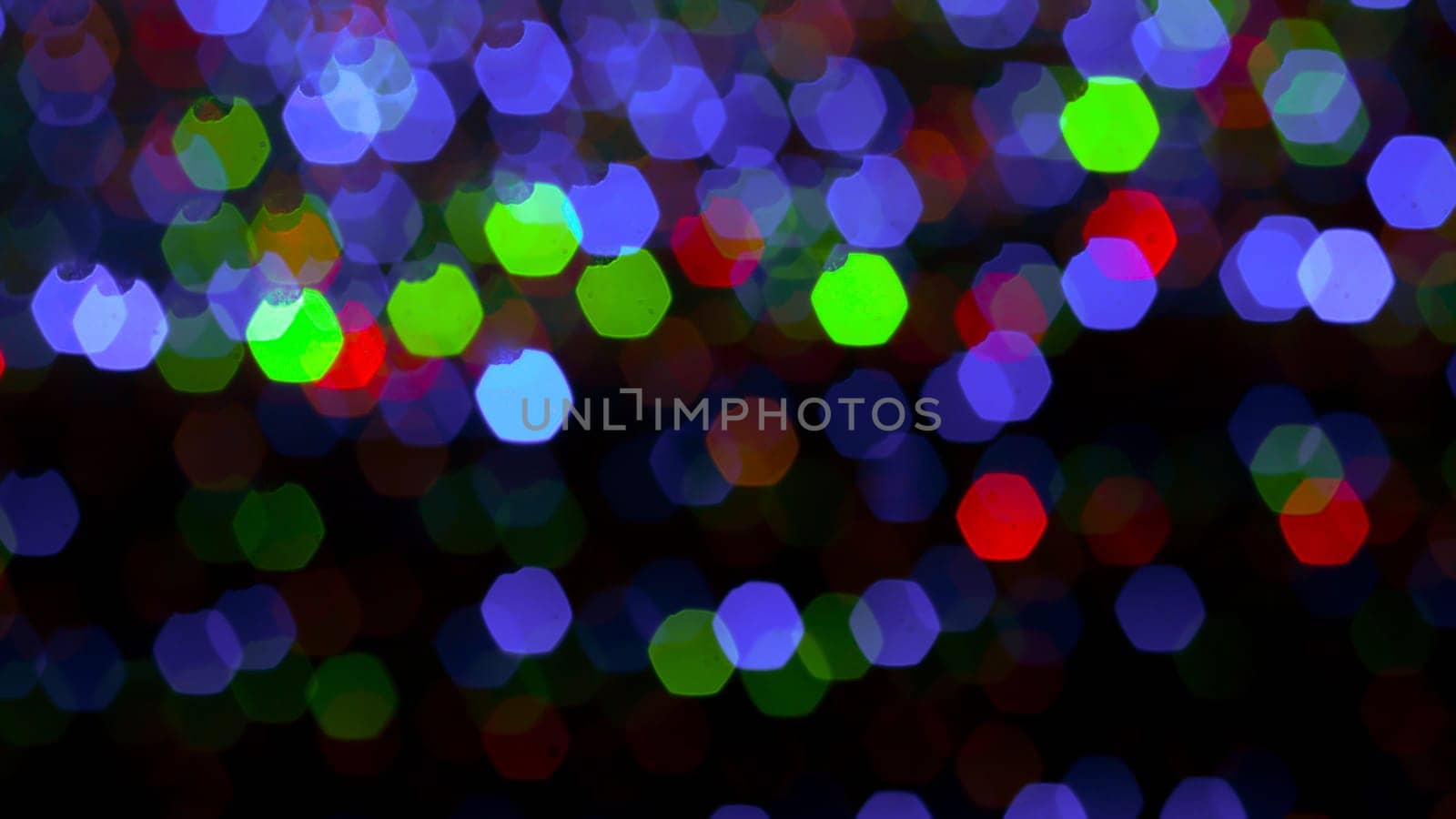 Abstract colorful bokeh light on golden background. Christmas and New Year theme