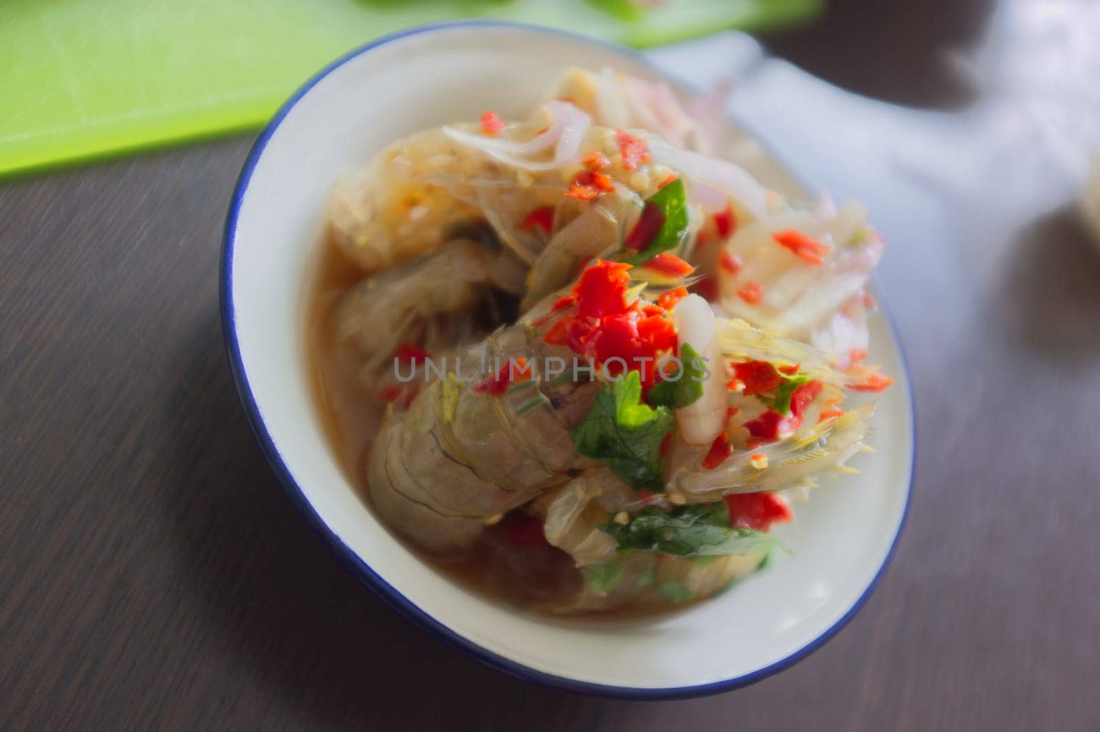 Raw mantis shrimp dressing spicy and sour fish sauce  . THAI food