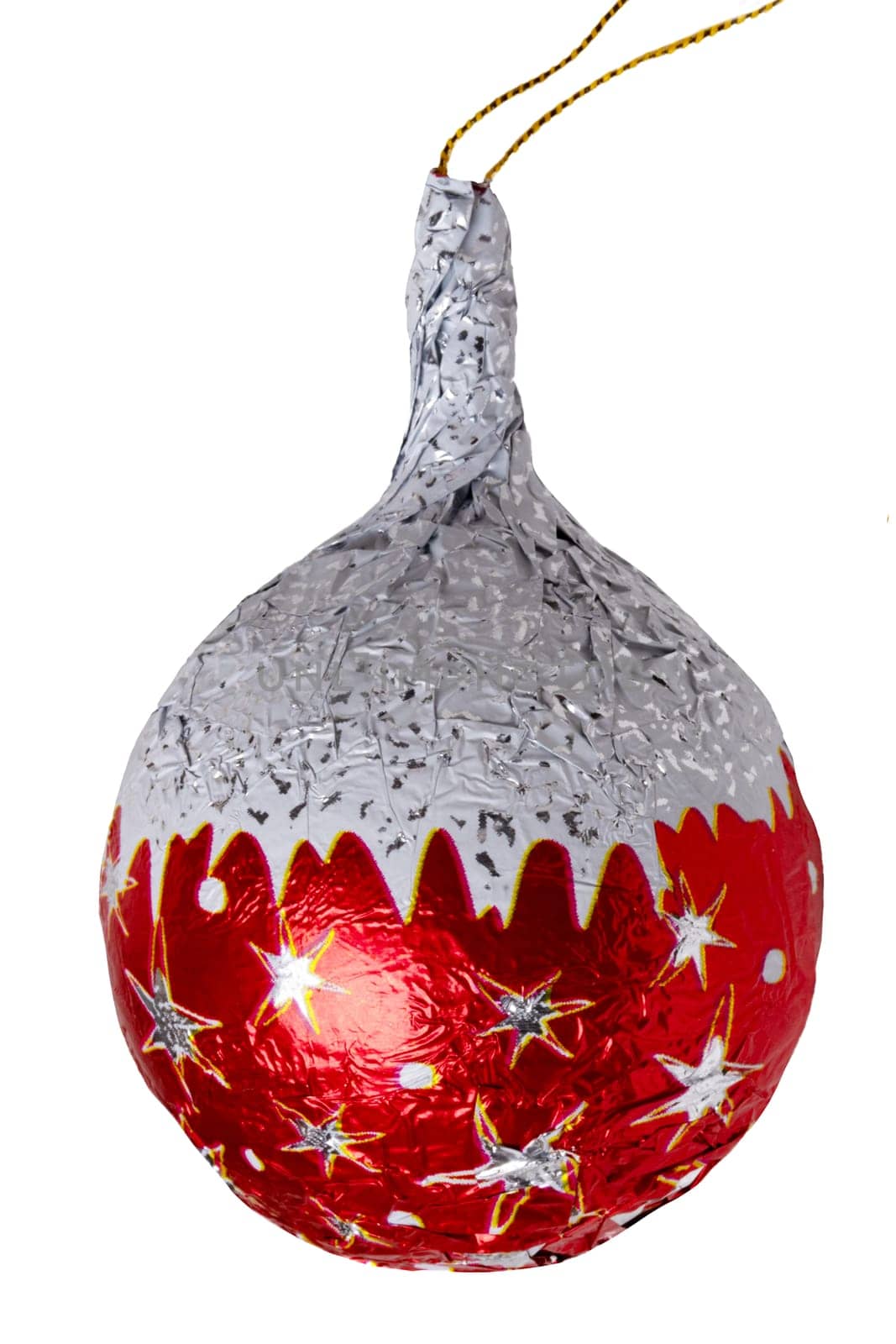 Christmas tree decorations. Close-up of cheerful wrapped chocolate xmas balls and cones figurines isolated on a white background. Macro photograph.