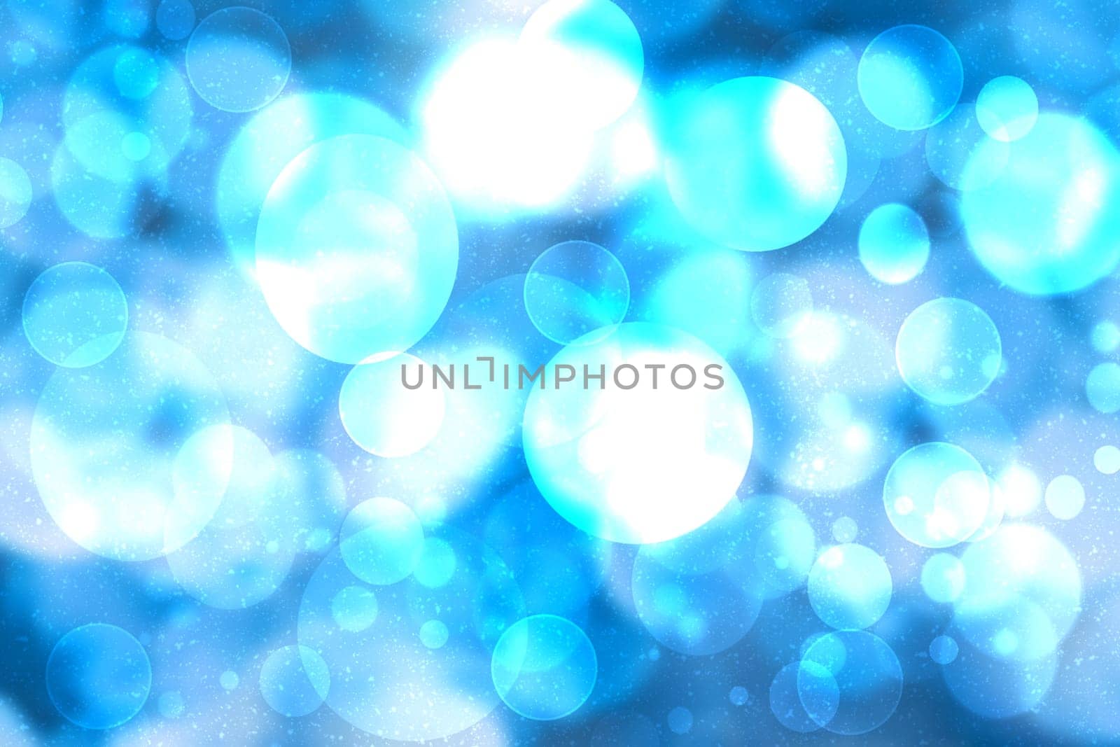 Abstract blurred festive delicate winter christmas or Happy New Year background texture with shiny turquoise blue white circular bokeh lights. Beautiful backdrop. Card concept.