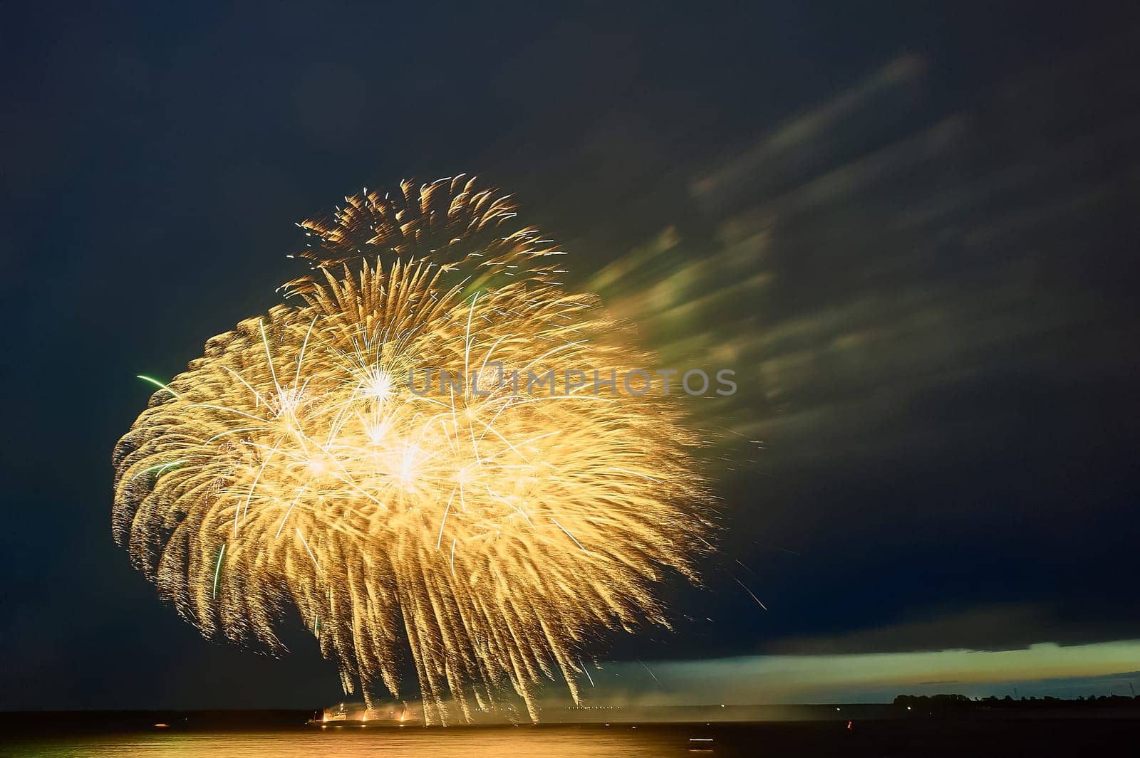 Colorful fireworks on the black sky background. High quality photo