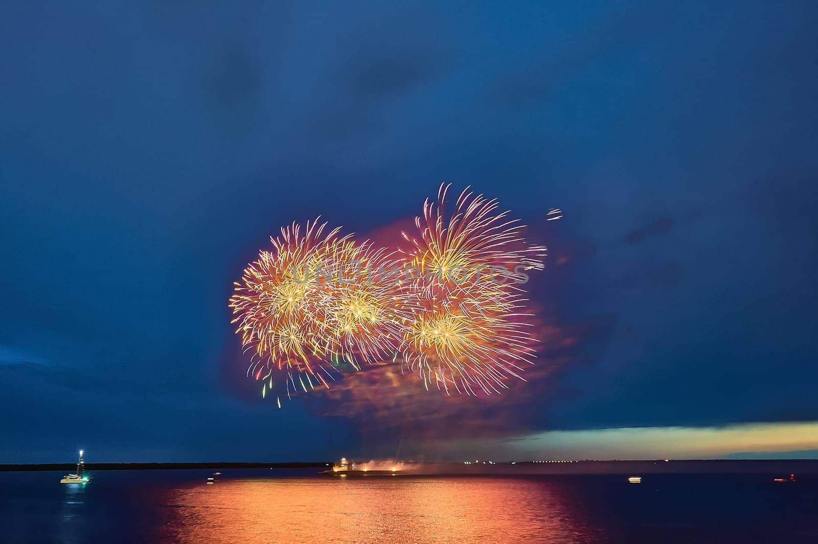 Colorful fireworks on the black sky background. High quality photo