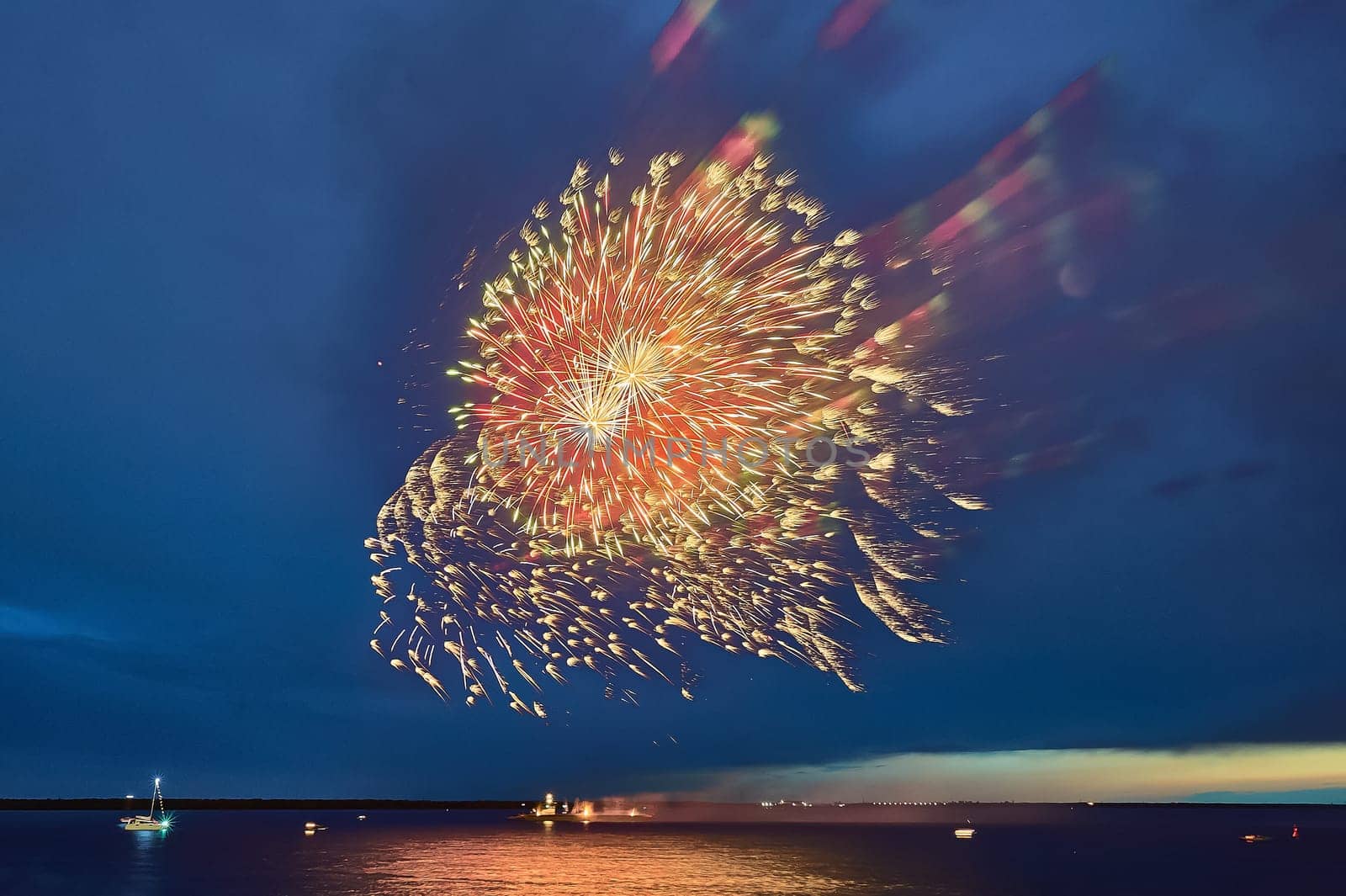 Colorful fireworks on the black sky background. High quality photo