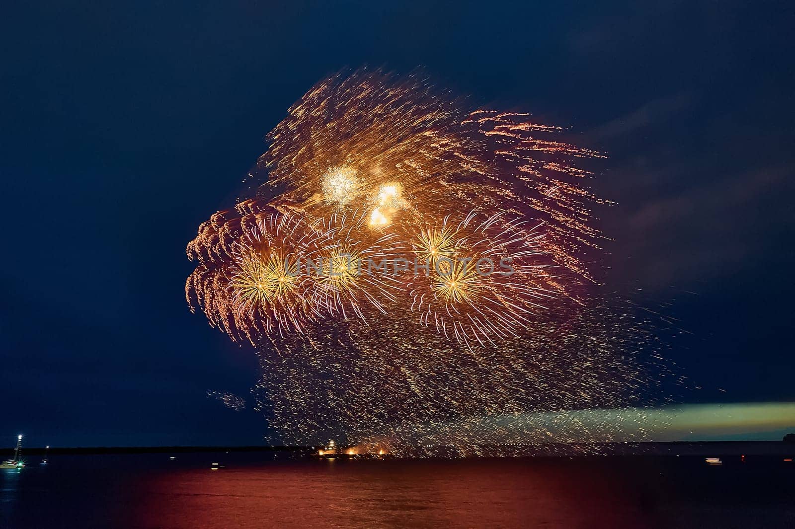 Colorful fireworks on the black sky background. High quality photo