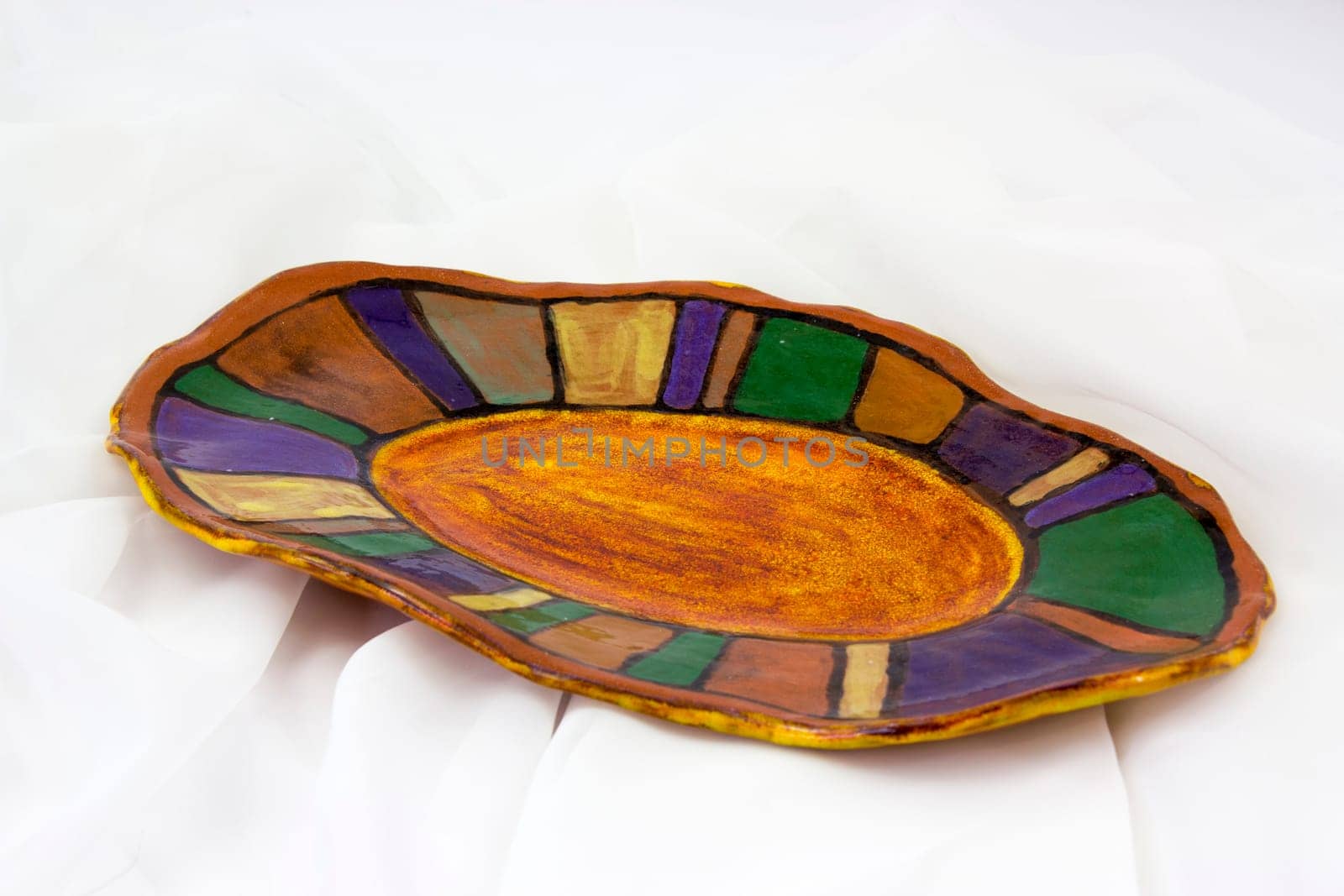 clay plate on white background - handmade pottery
