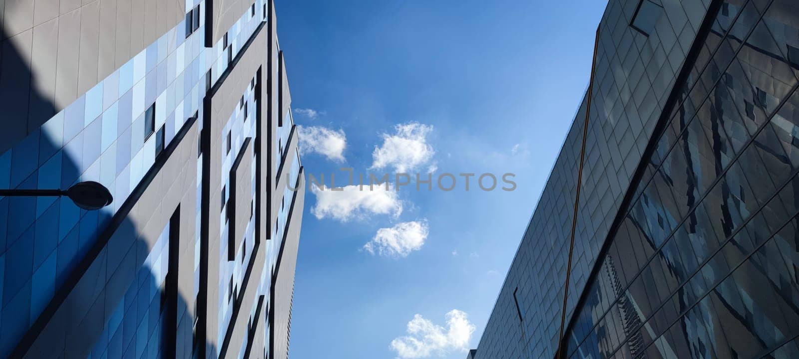The Reflection of sky and could on modern commercial building