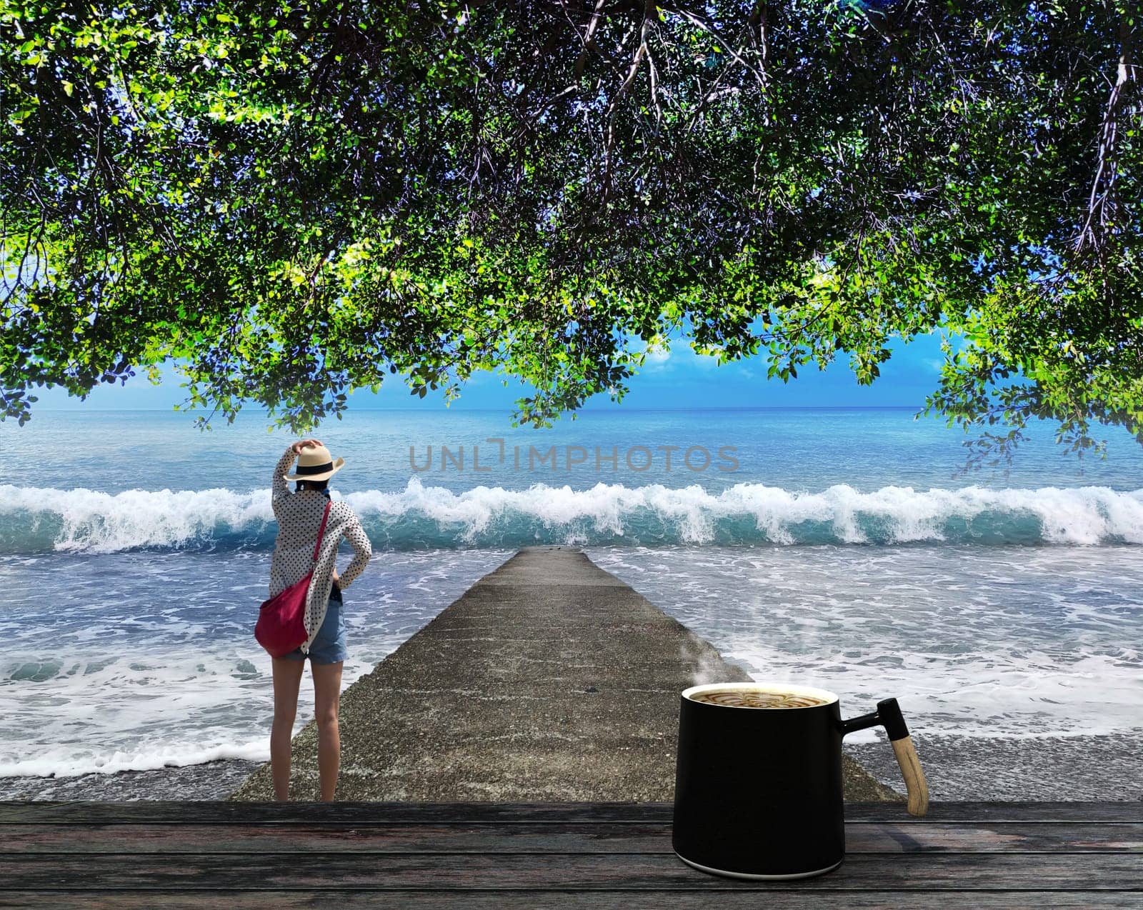 The woman standing facing the sea and looking to the far